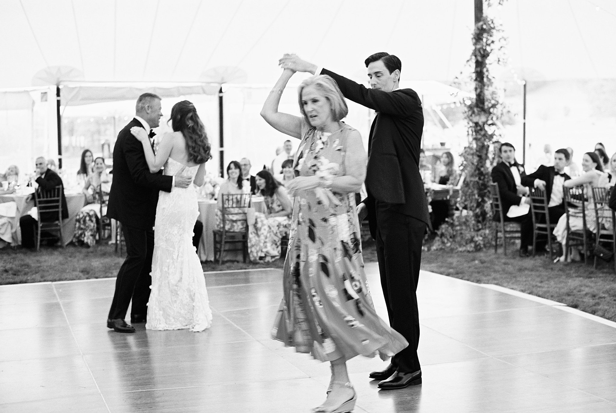 father daughter dance and mother son dance happen on dance floor by Catskills NY wedding photographer