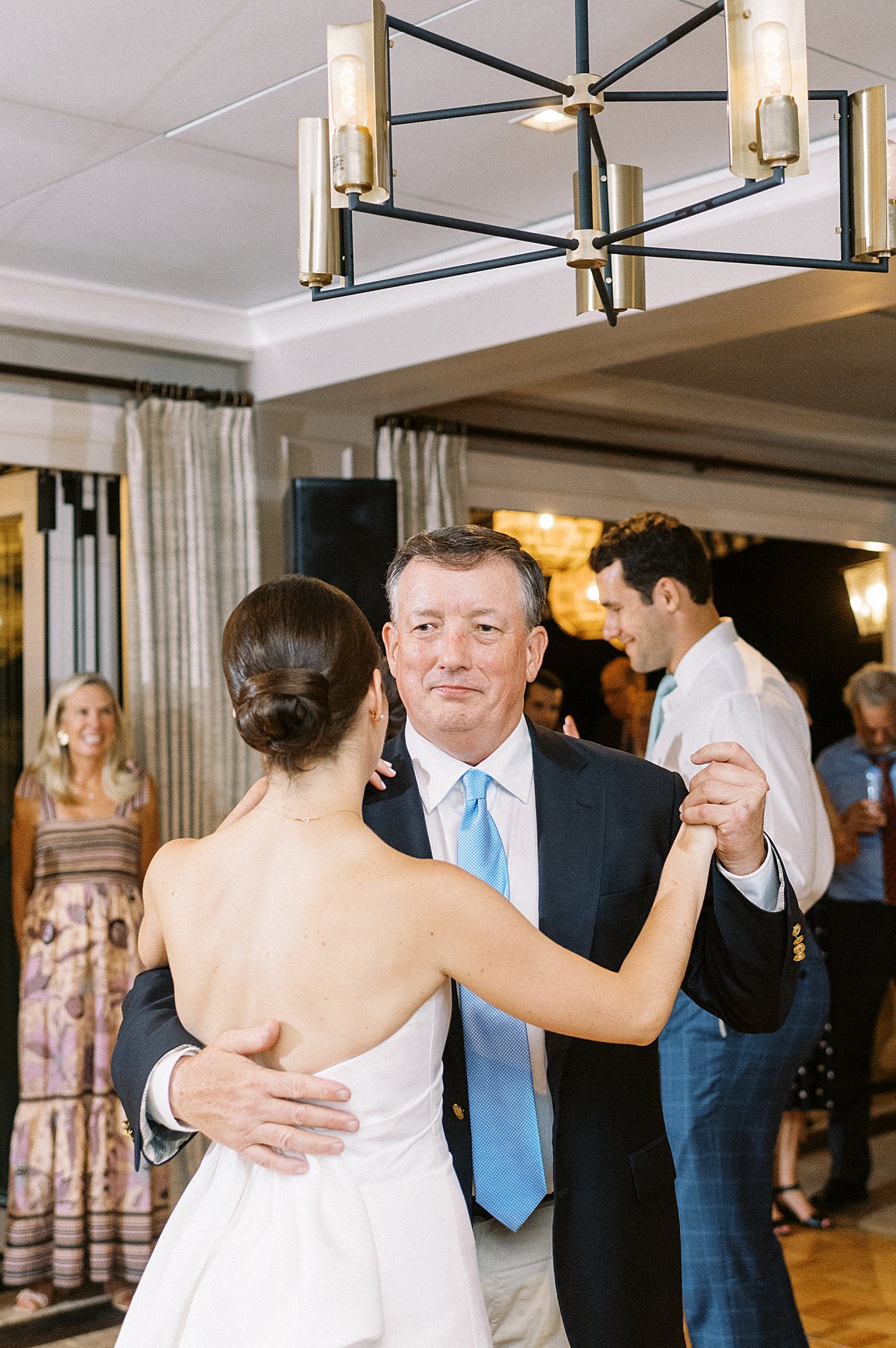 father of the bride dances with his daughter at reception by Lynne Reznick Photography 