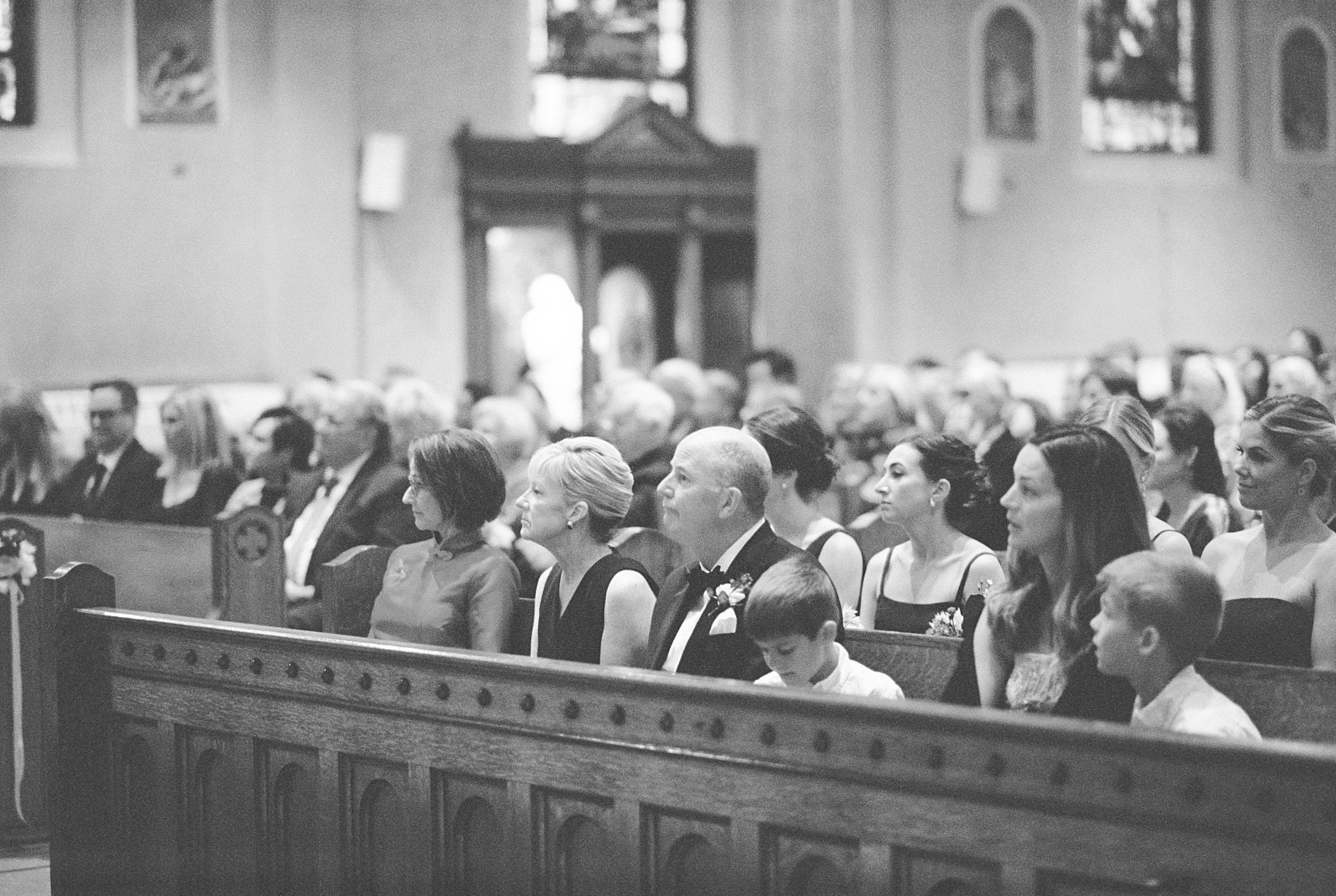 guests watch ceremony by NYC wedding photographer 