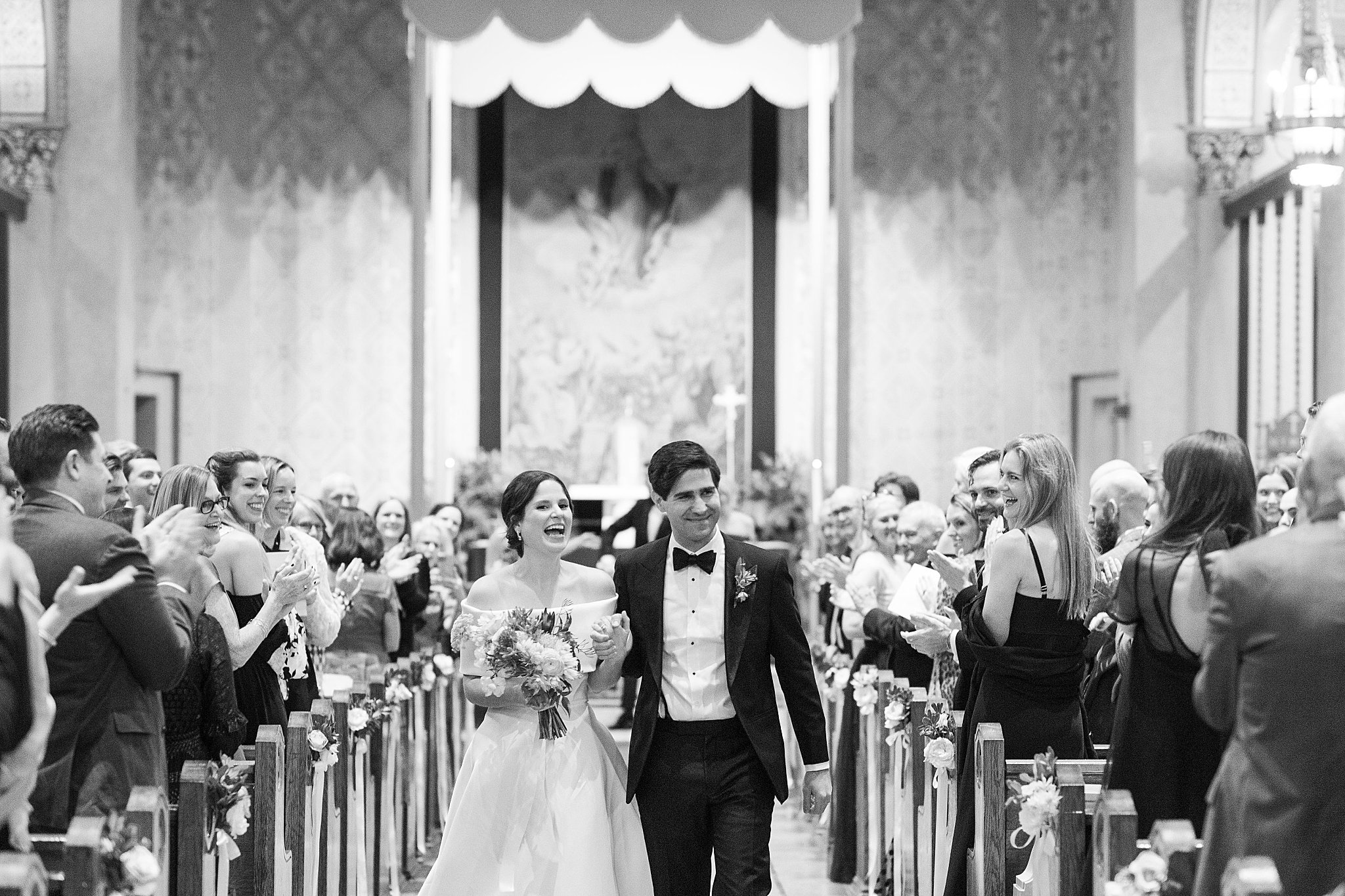 couple walks down aisle by Lynne Reznick Photography