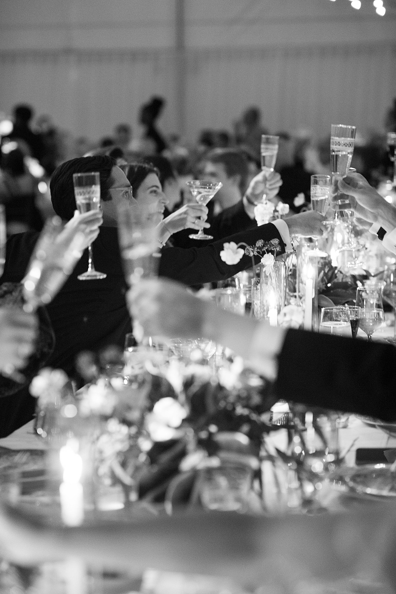 guests toast glasses by NYC wedding photographer 