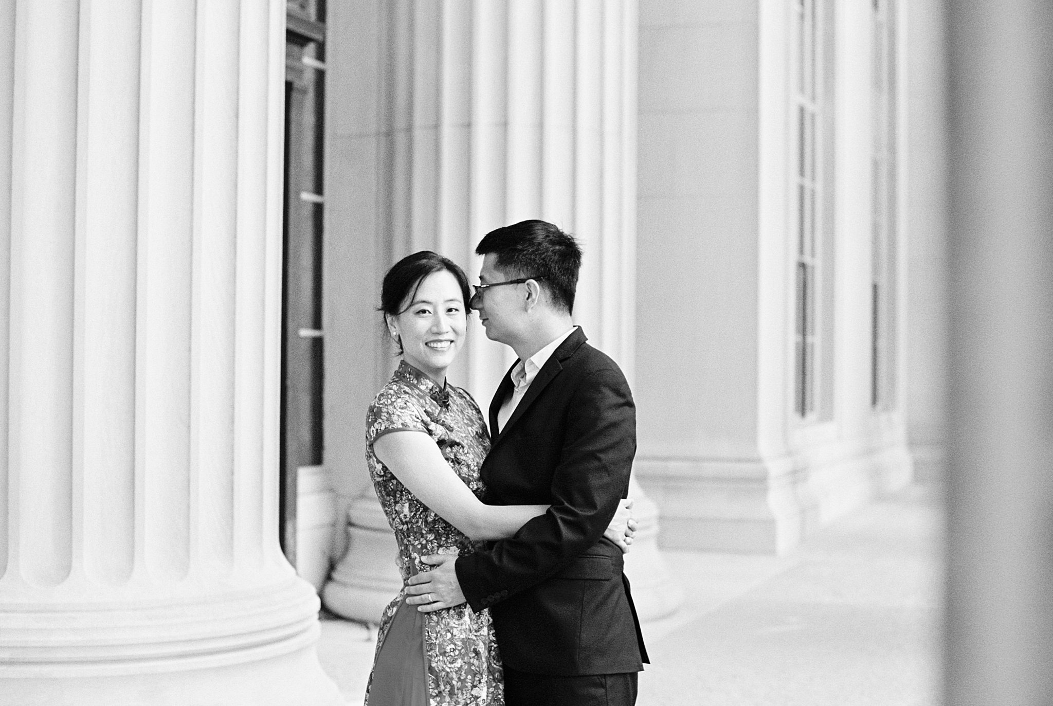 woman smiles as man leans close to her by Boston photographer