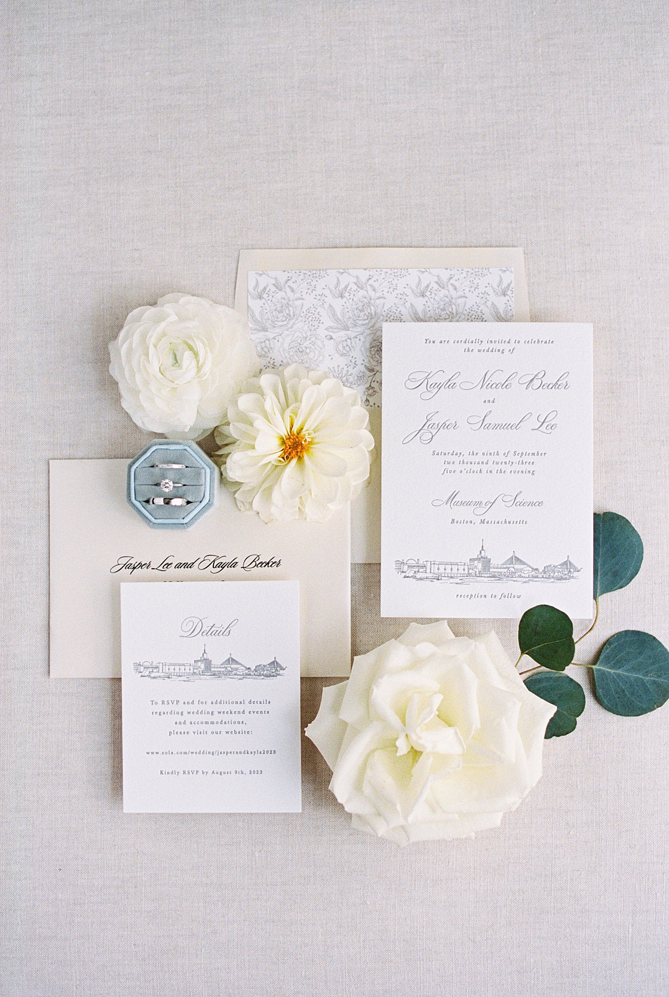 stationery suite flay lay with rings by Boston Wedding Photographer