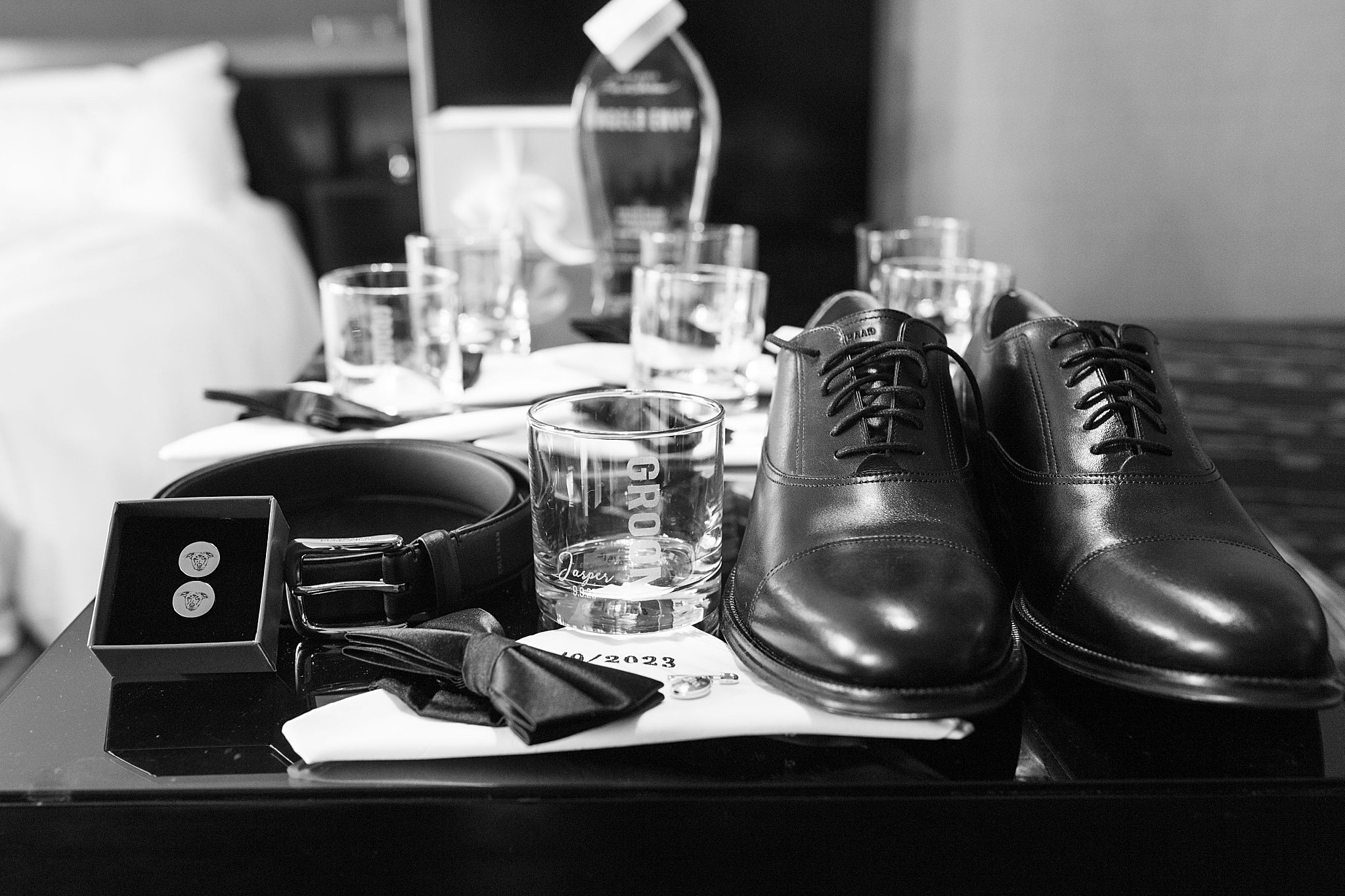 groom's accessories laid out on table at Museum of Science wedding