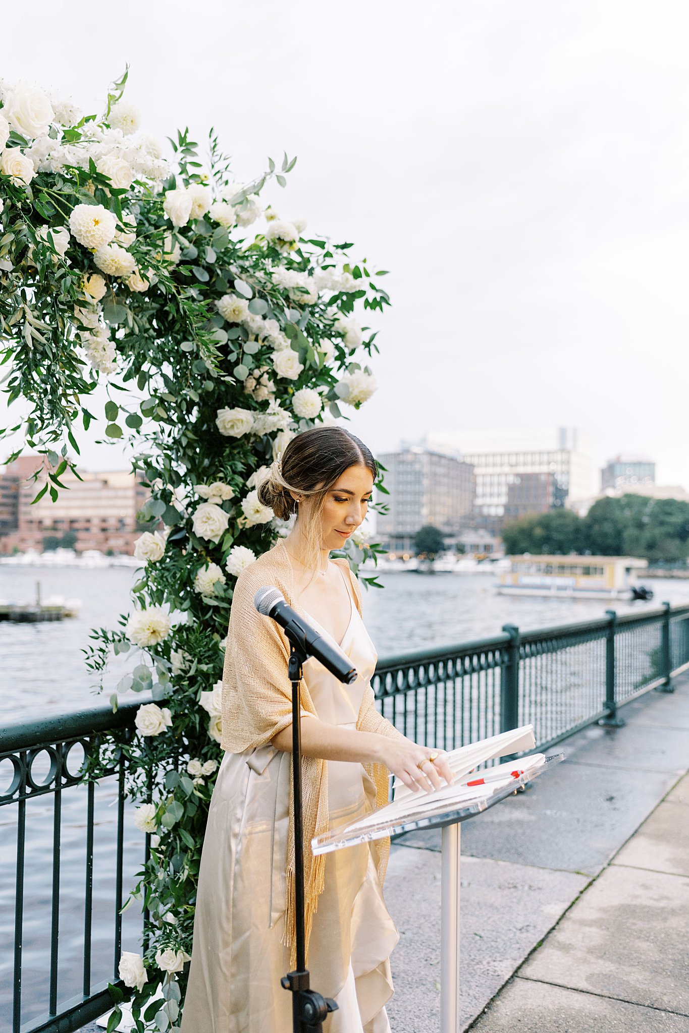 officiant prepares before ceremony by Boston Wedding Photographer