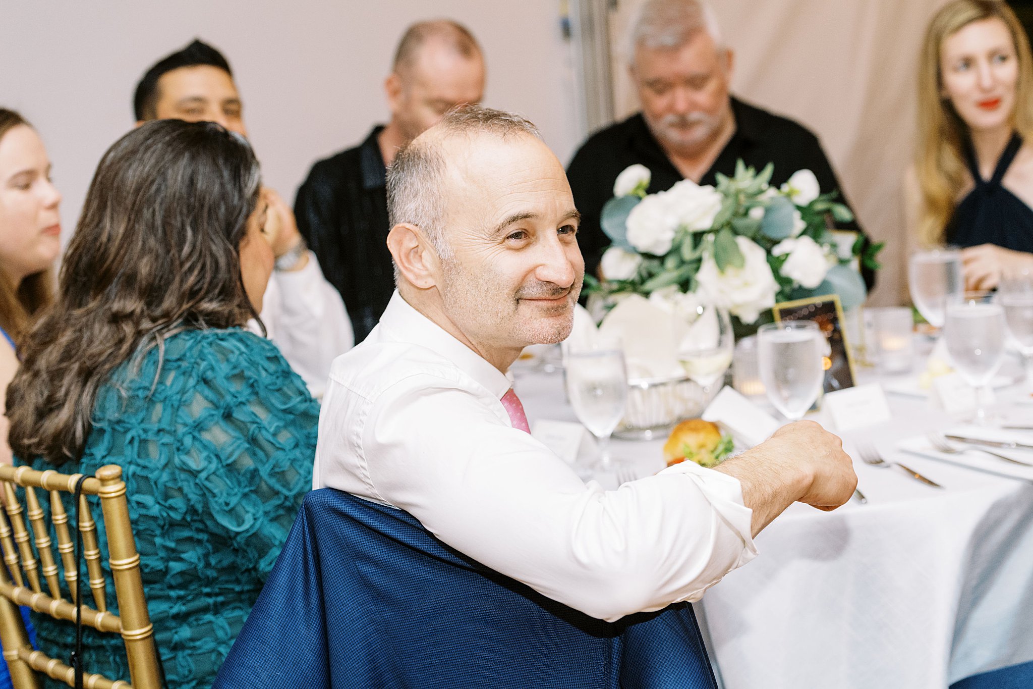 guests watch toasts at reception by Boston Wedding Photographer