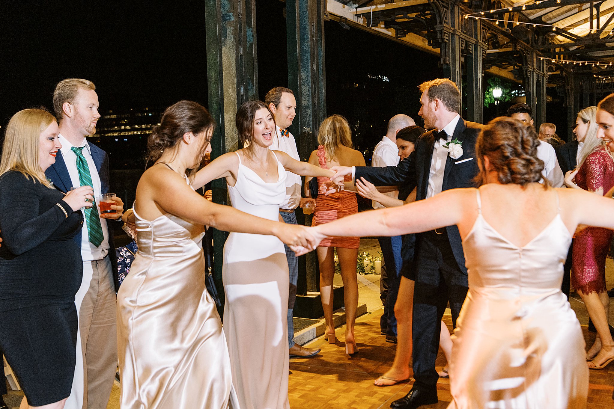 bridesmaids dance together during reception