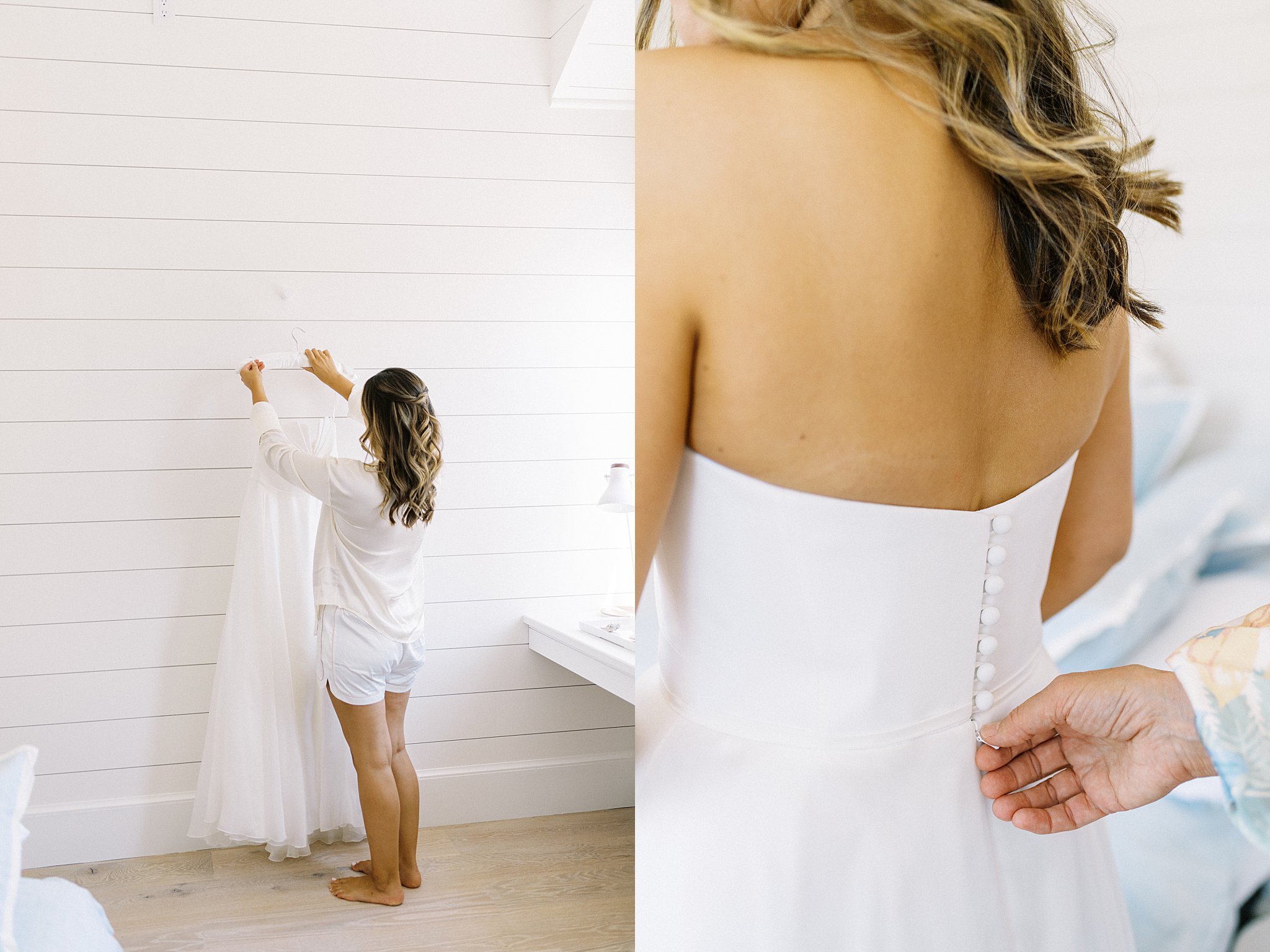 bride looks at her gown by Lynne Reznick Photography