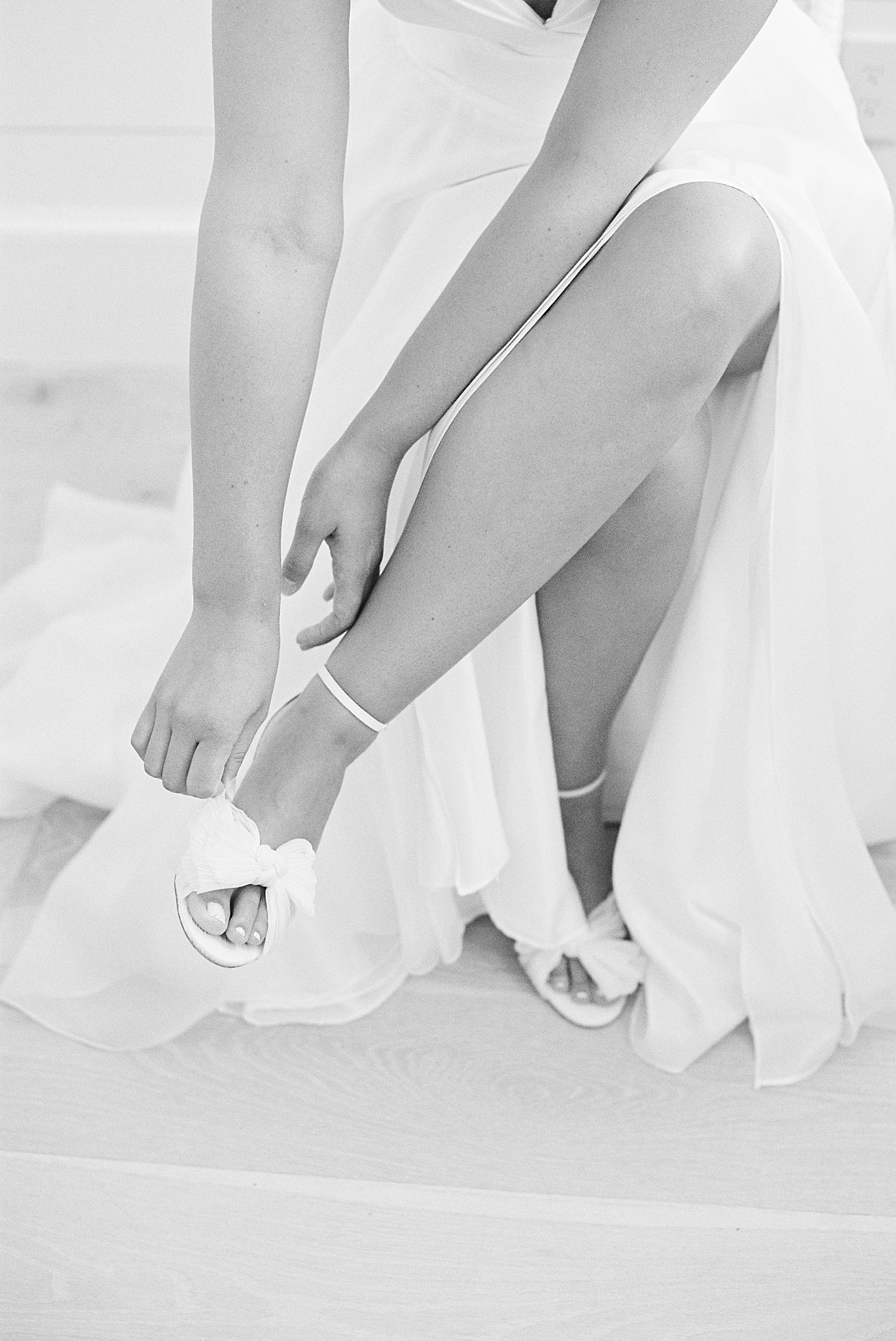 bride puts on her shoes at The Bohlin