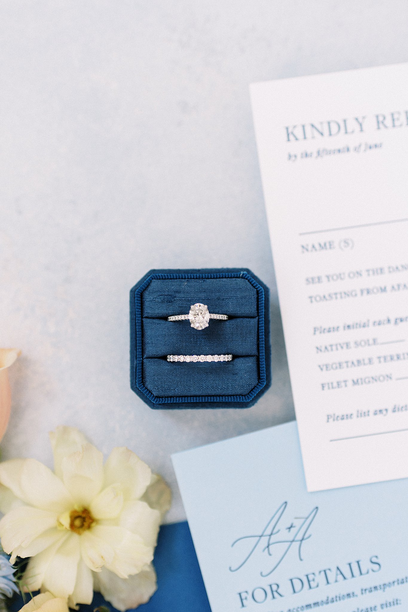 bridal ring set with stationery flat lay at The Bohlin