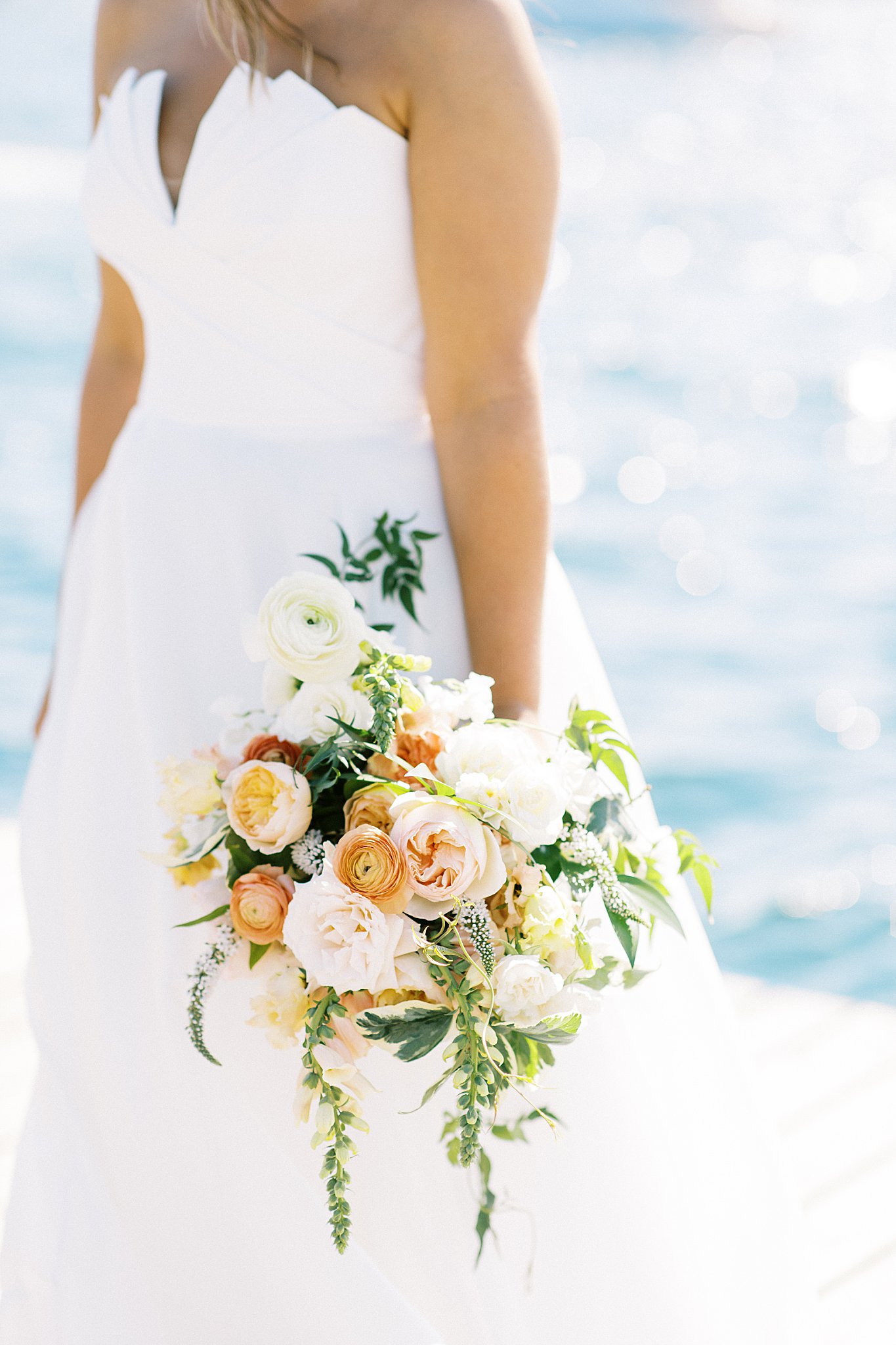 hanging bridal florals in bouquet held by bride at The Bohlin