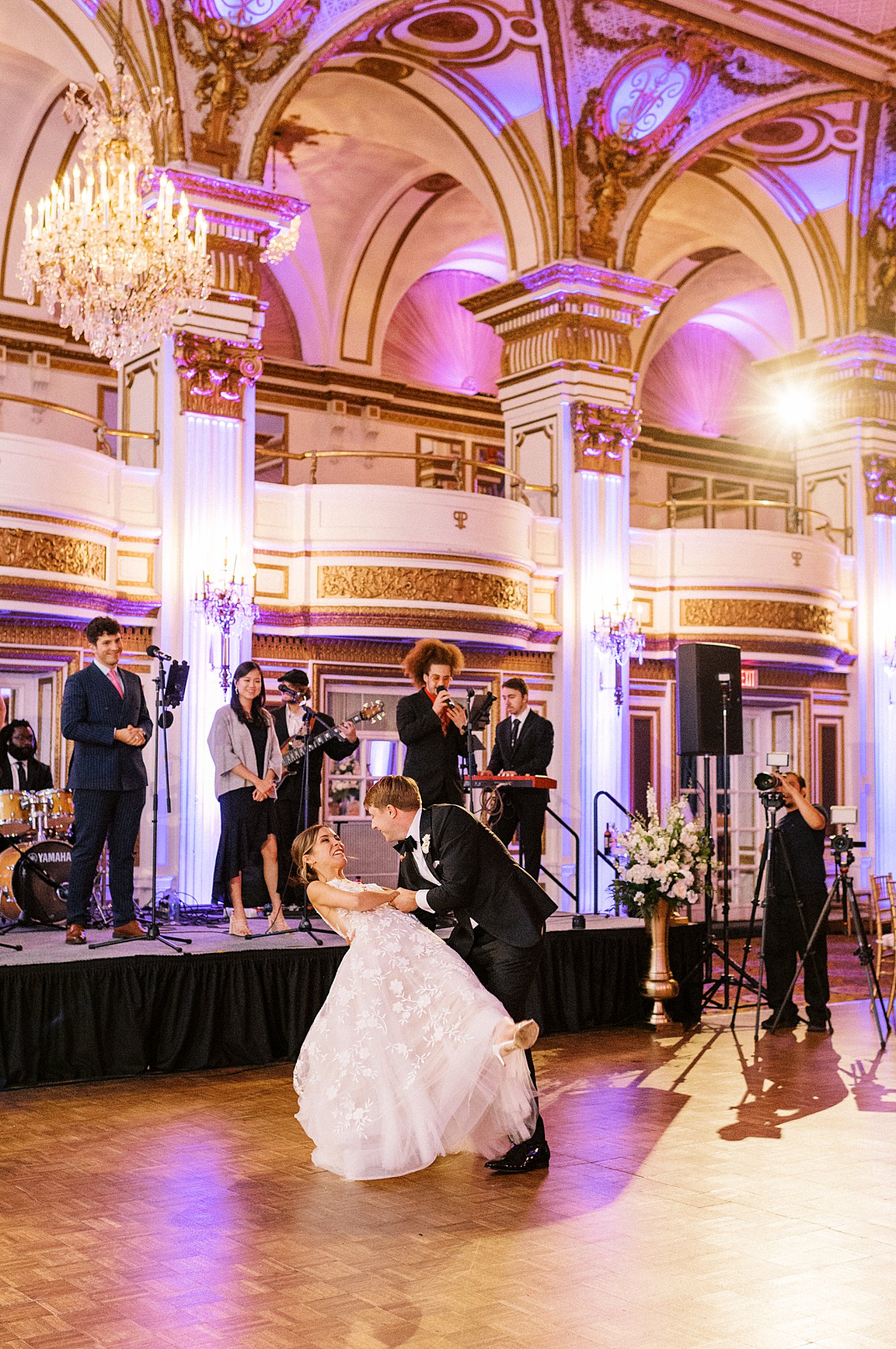 man dips his bride by Lynne Reznick Photography