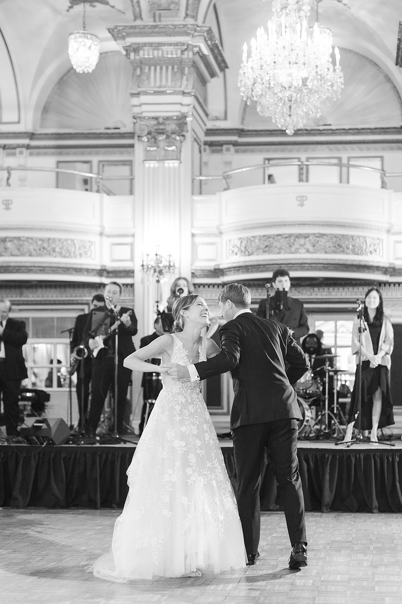 woman grins during reception at her first dance