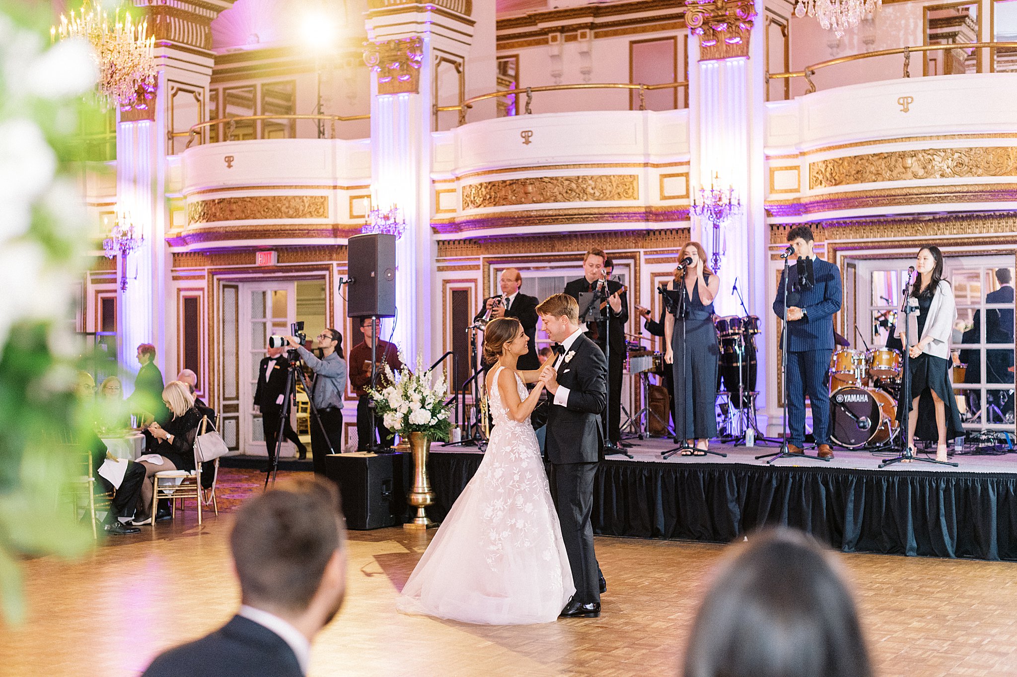 couple looks into each other's eyes on dancefloor by Boston wedding photographer