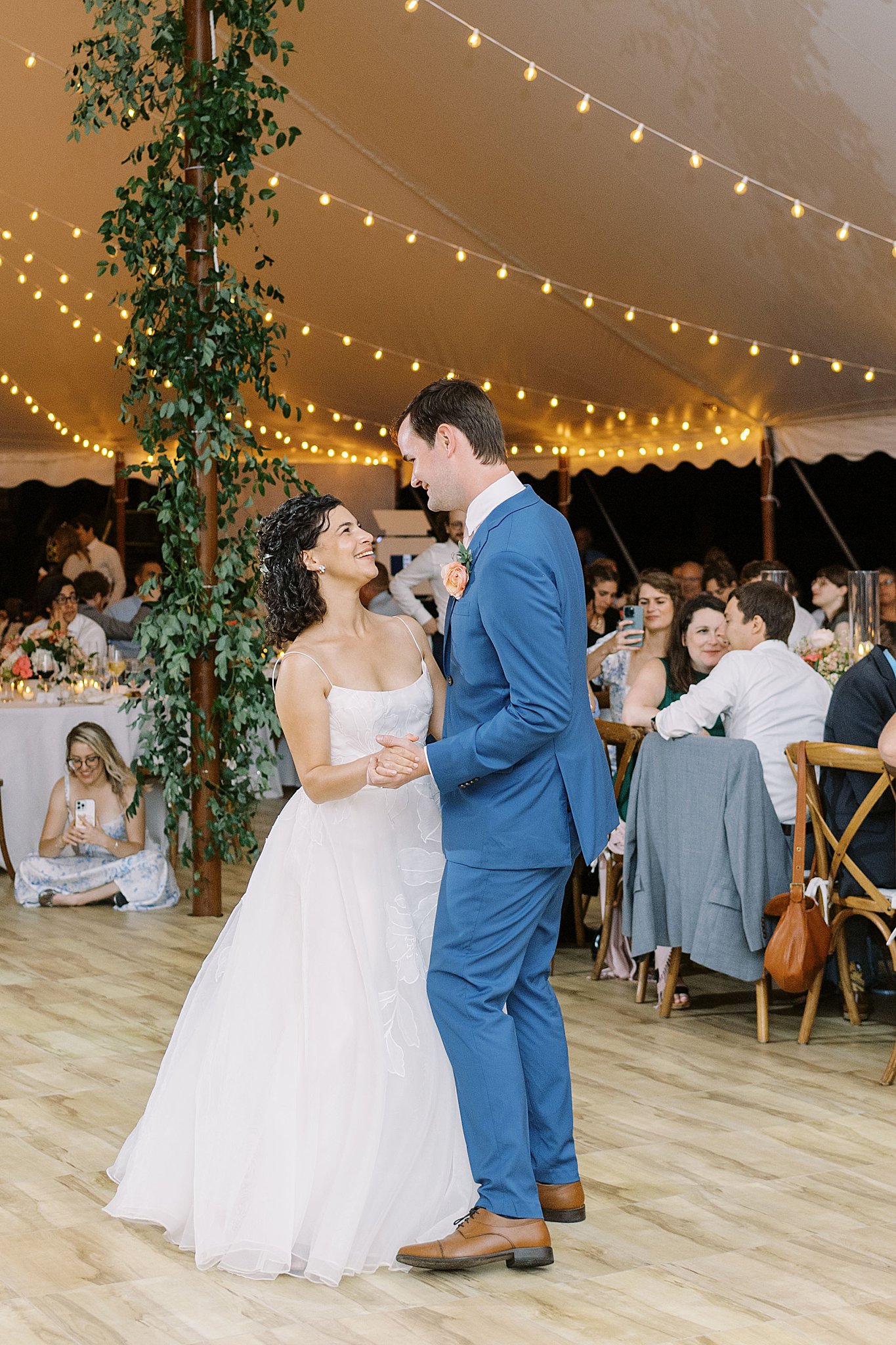 couple looks into each other's eyes as they dance by Lynne Reznick Photography