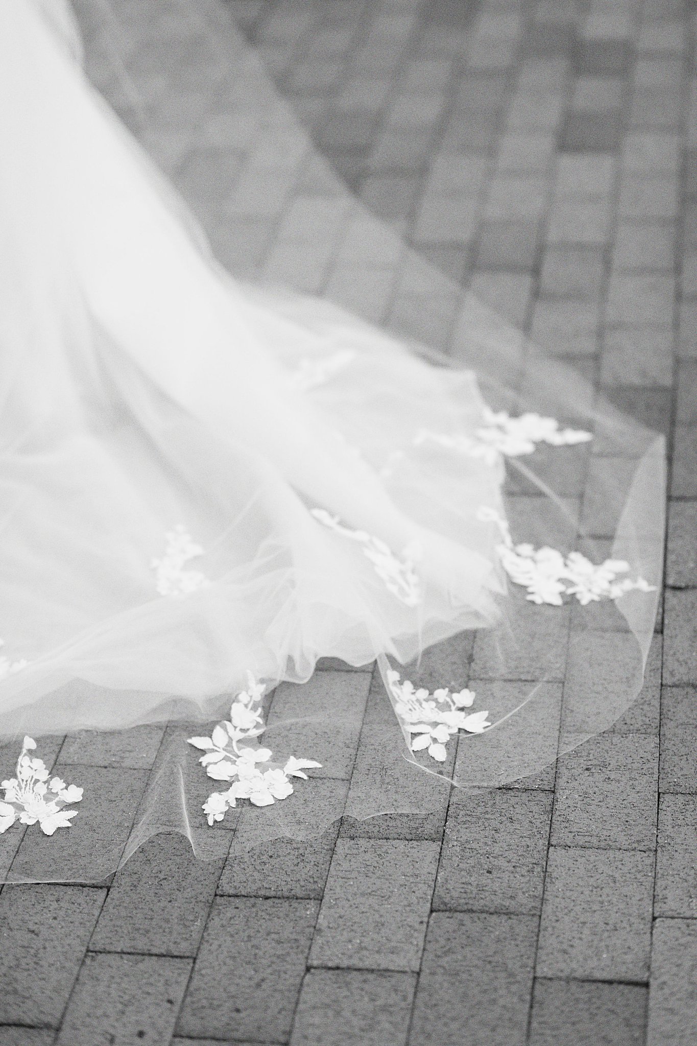 wedding gown has lace details at Boston Harbor Hotel