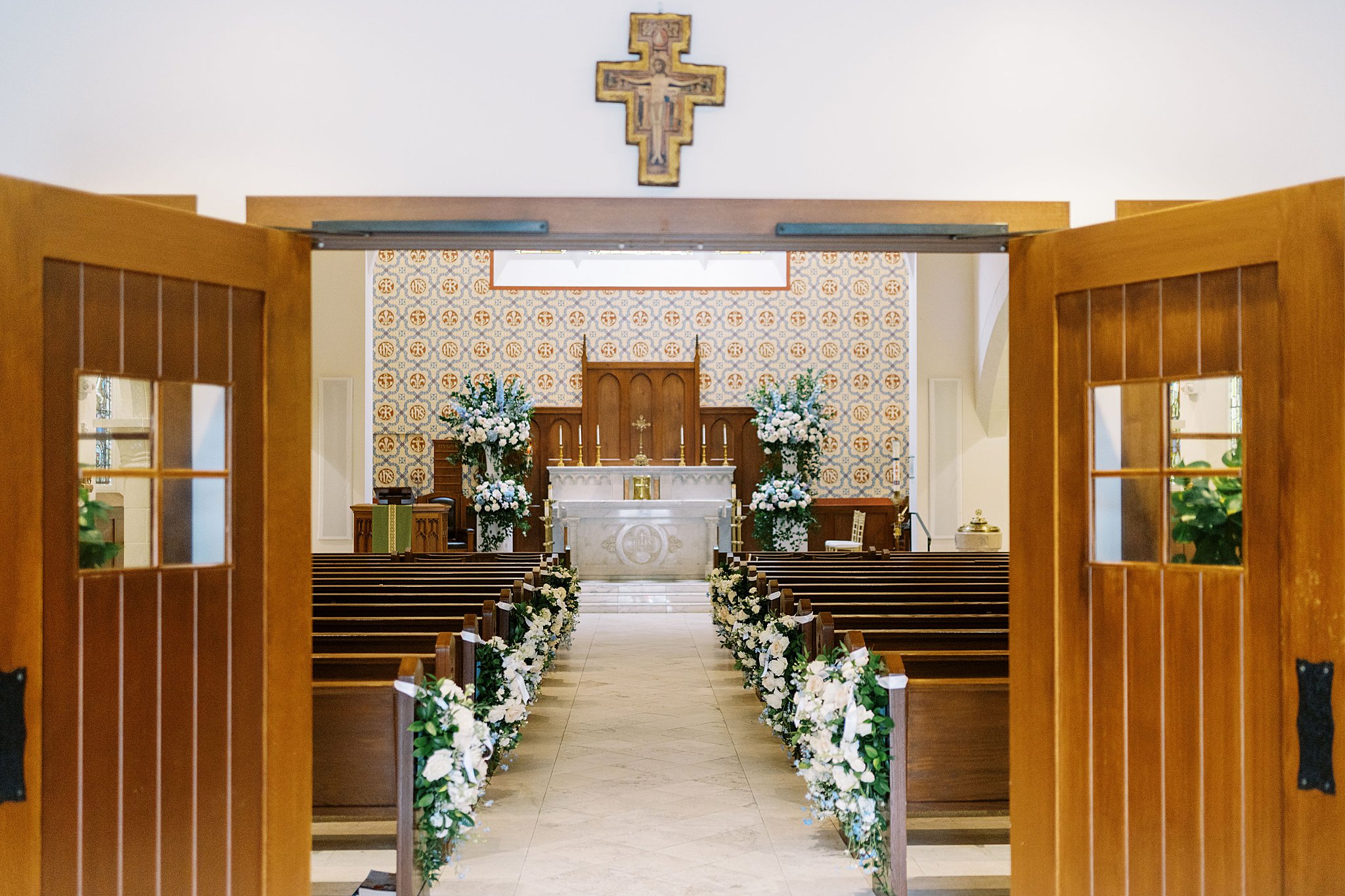 church draped in florals before reception at Boston Harbor Hotel