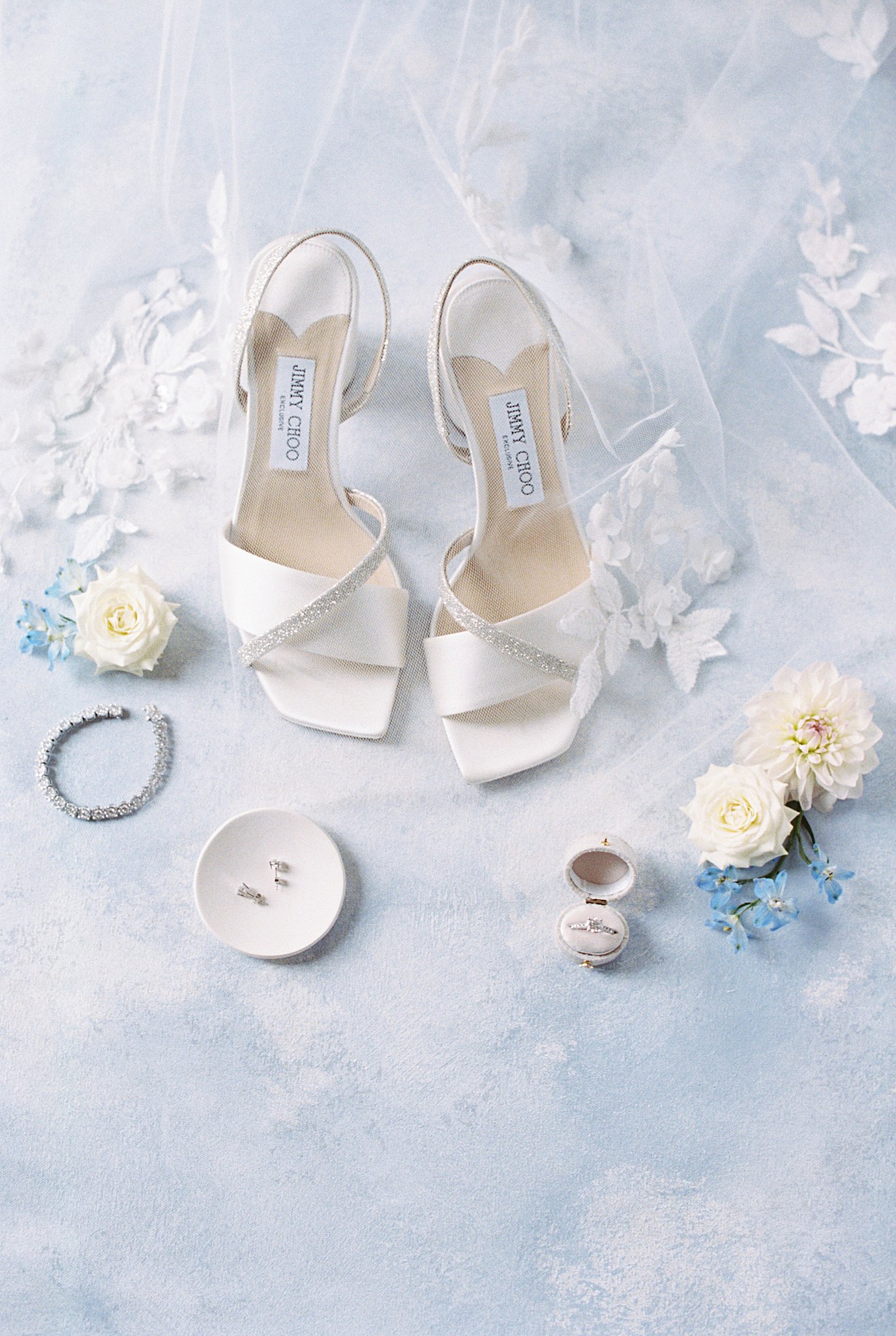 bridal details laid out with florals by Lynne Reznick Photography 