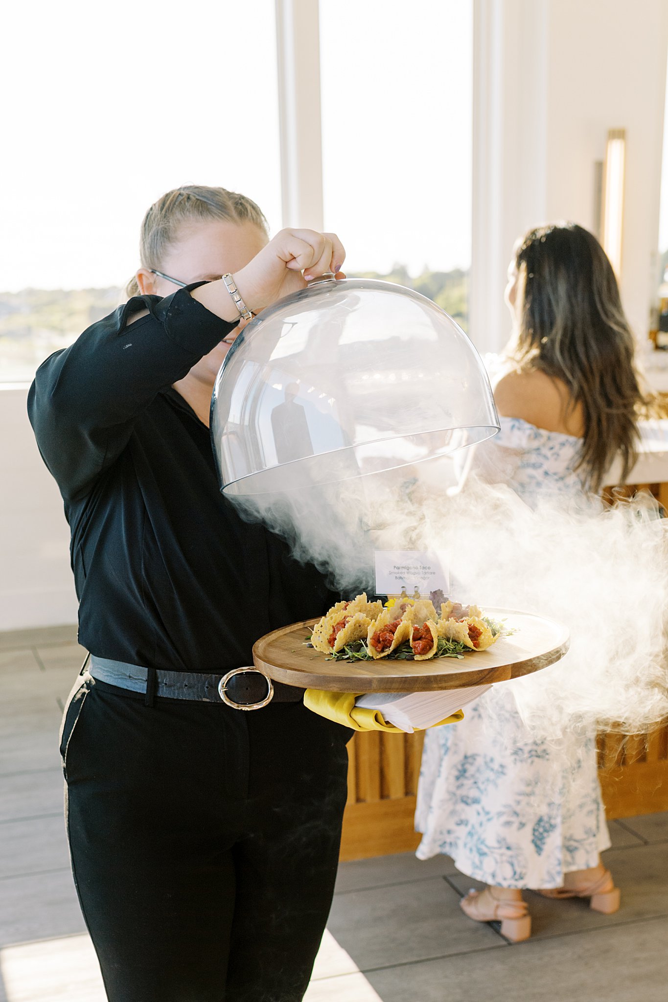 server lifts cover as smoke pours out of passed apps by Lynne Reznick Photography