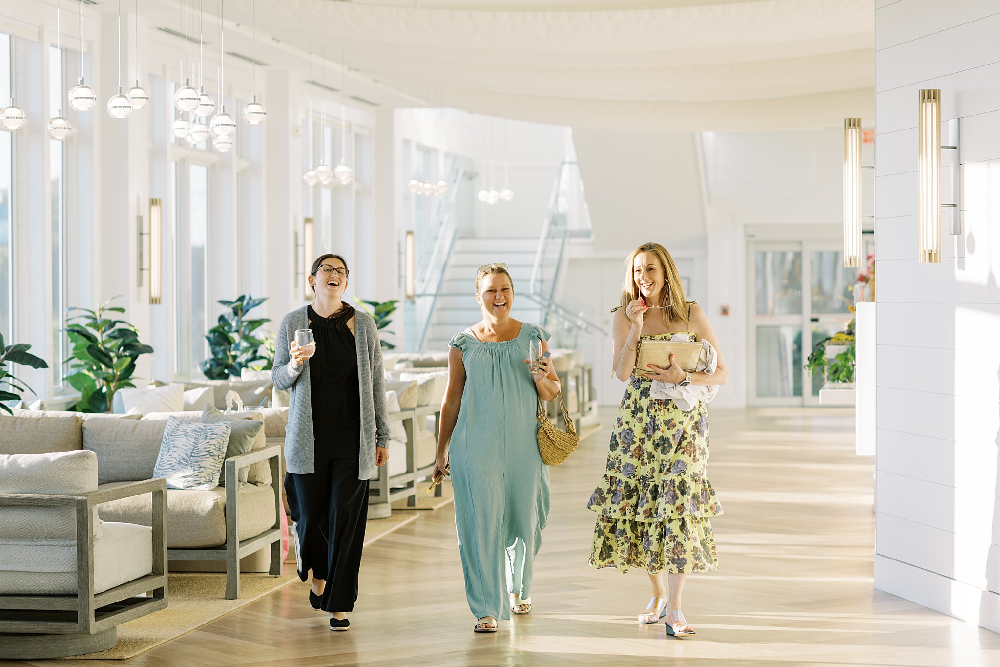 guests walk to dinner from cocktail hour by Lynne Reznick Photography