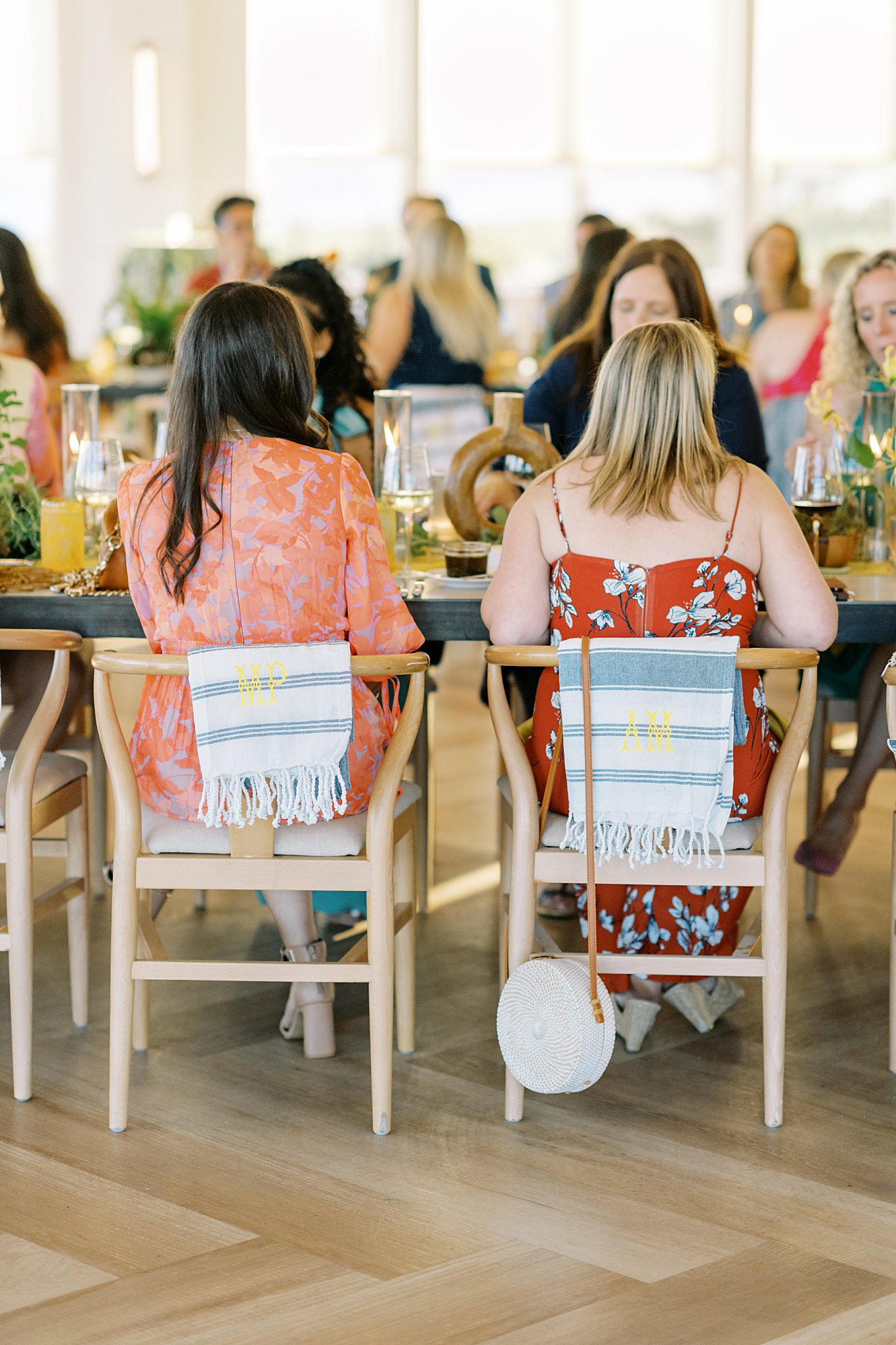 monogrammed Turkish Towels hang on guests chairs by Lynne Reznick Photography