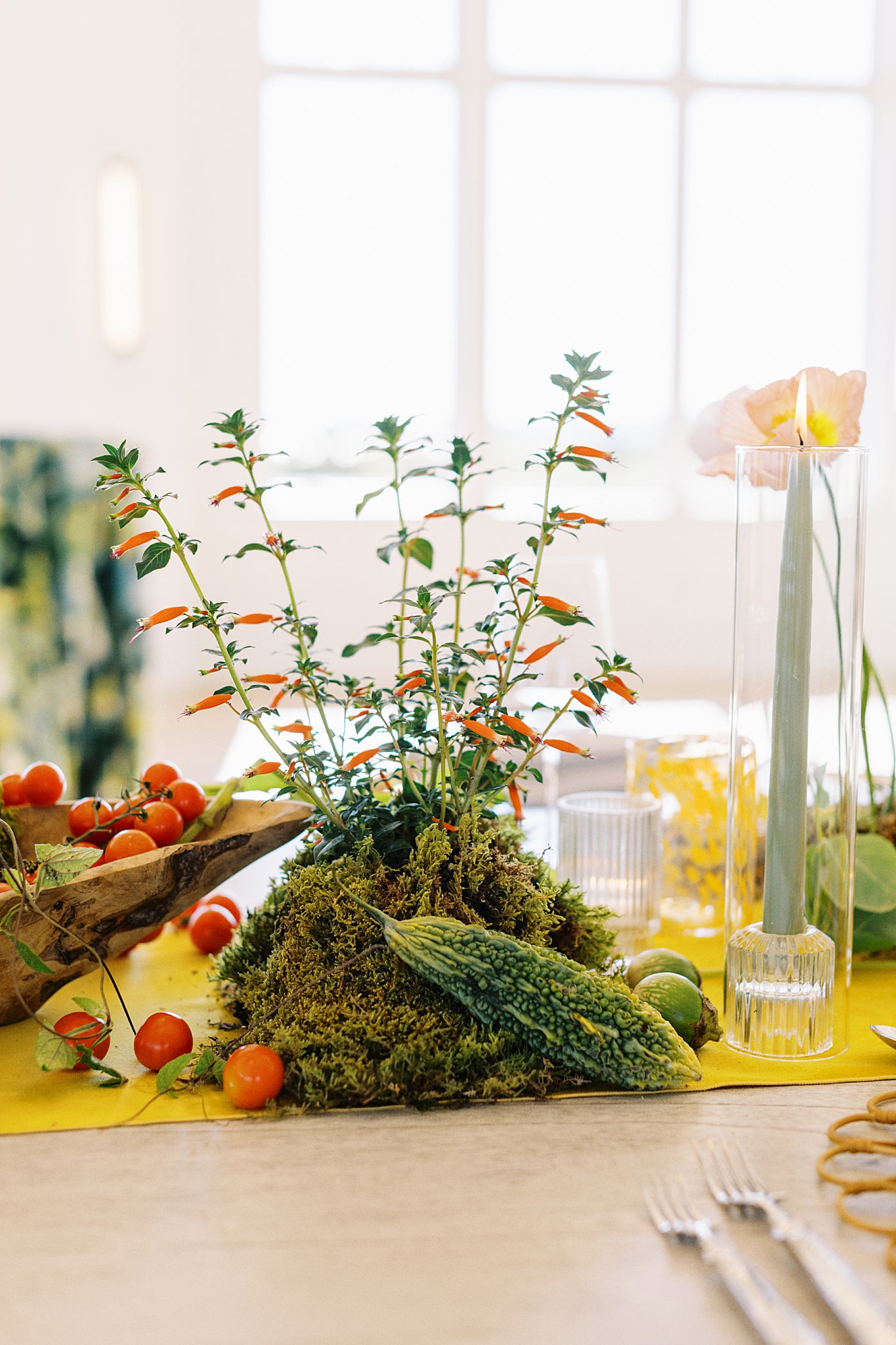 flowers sprout from moss on the table at Wychmere Boston Planners Dining Club