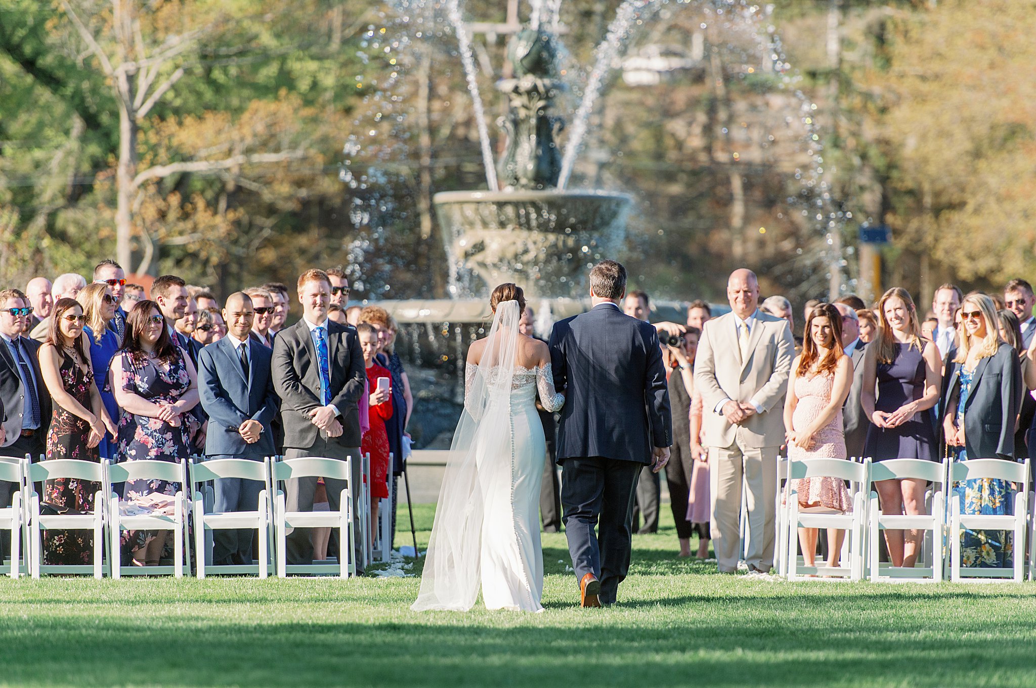 father walks daughter down the aisle by New England wedding photographer