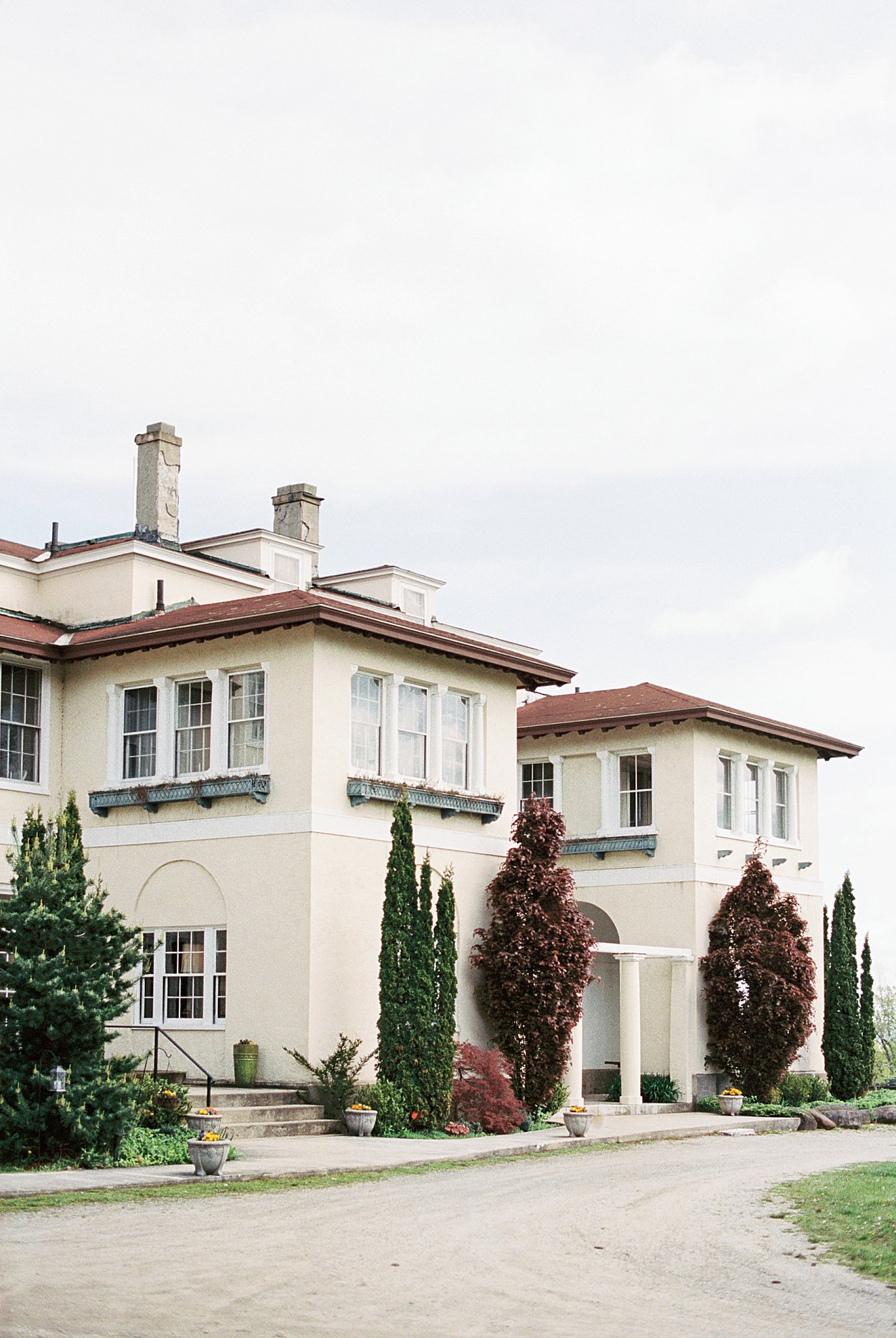 mansion overlooking water included in 8 European-inspired Wedding Venues in New England 