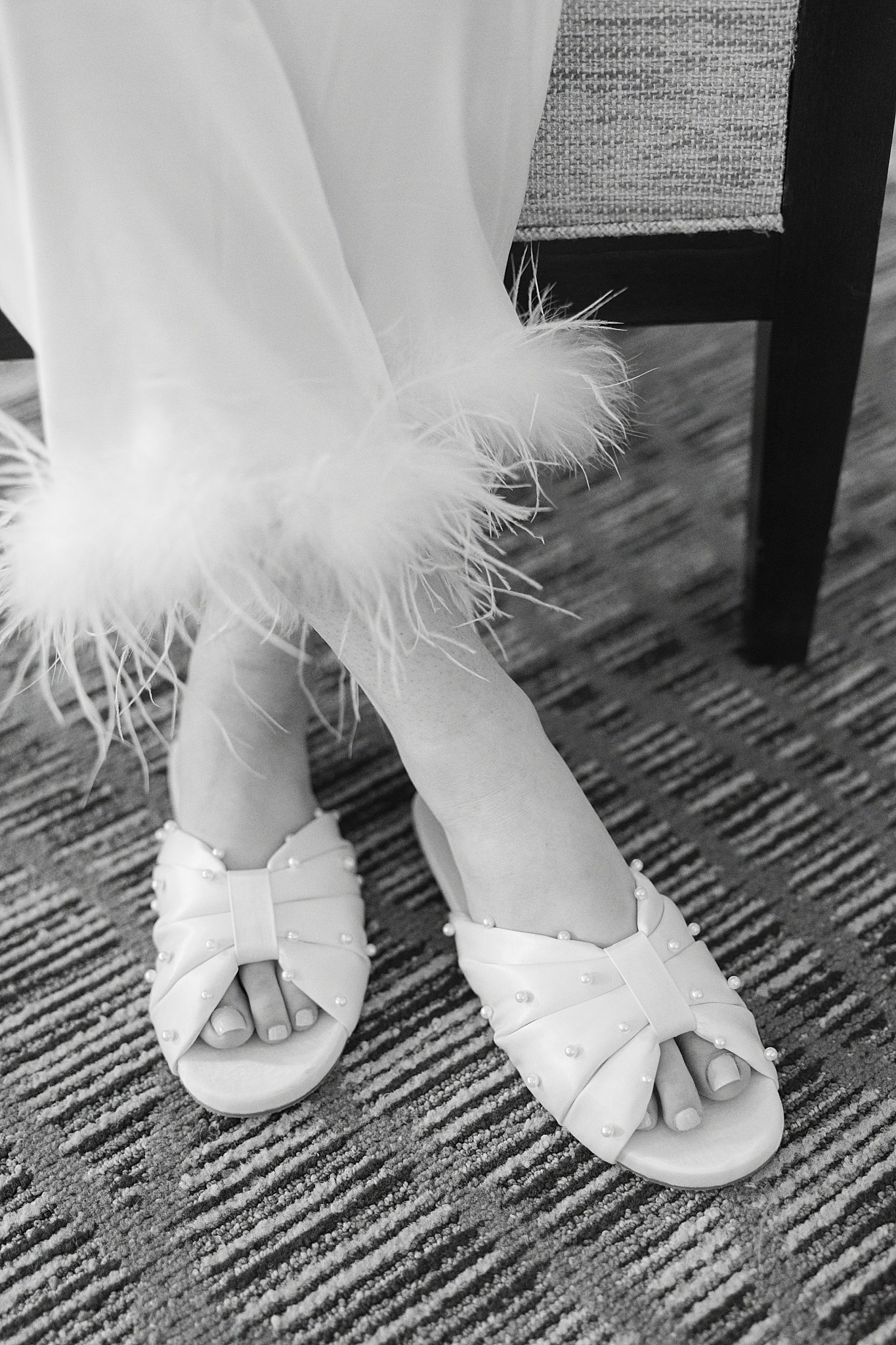 dressing gown has feathers and shoes adorned with pearls by Lynne Reznick Photography