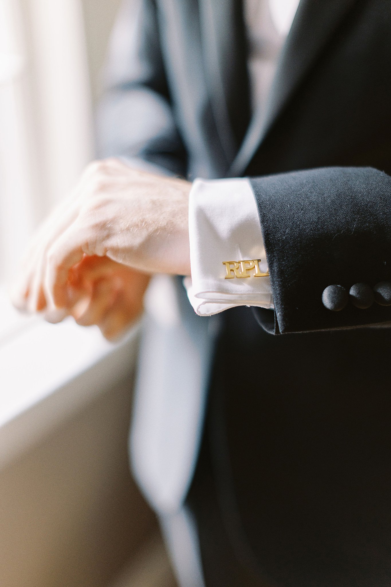 man's cufflinks have his initials by Boston wedding photographer