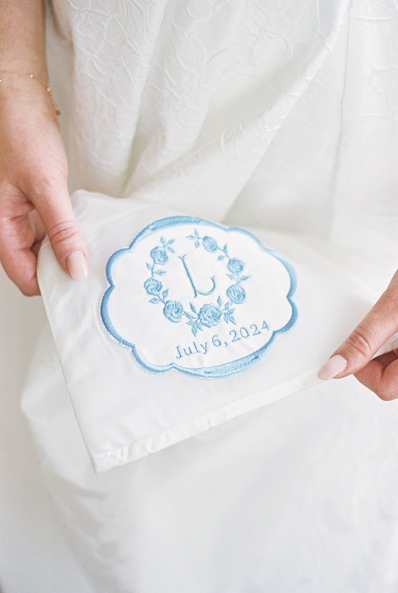 custom embroidery on the inside of wedding gown by Boston wedding photographer