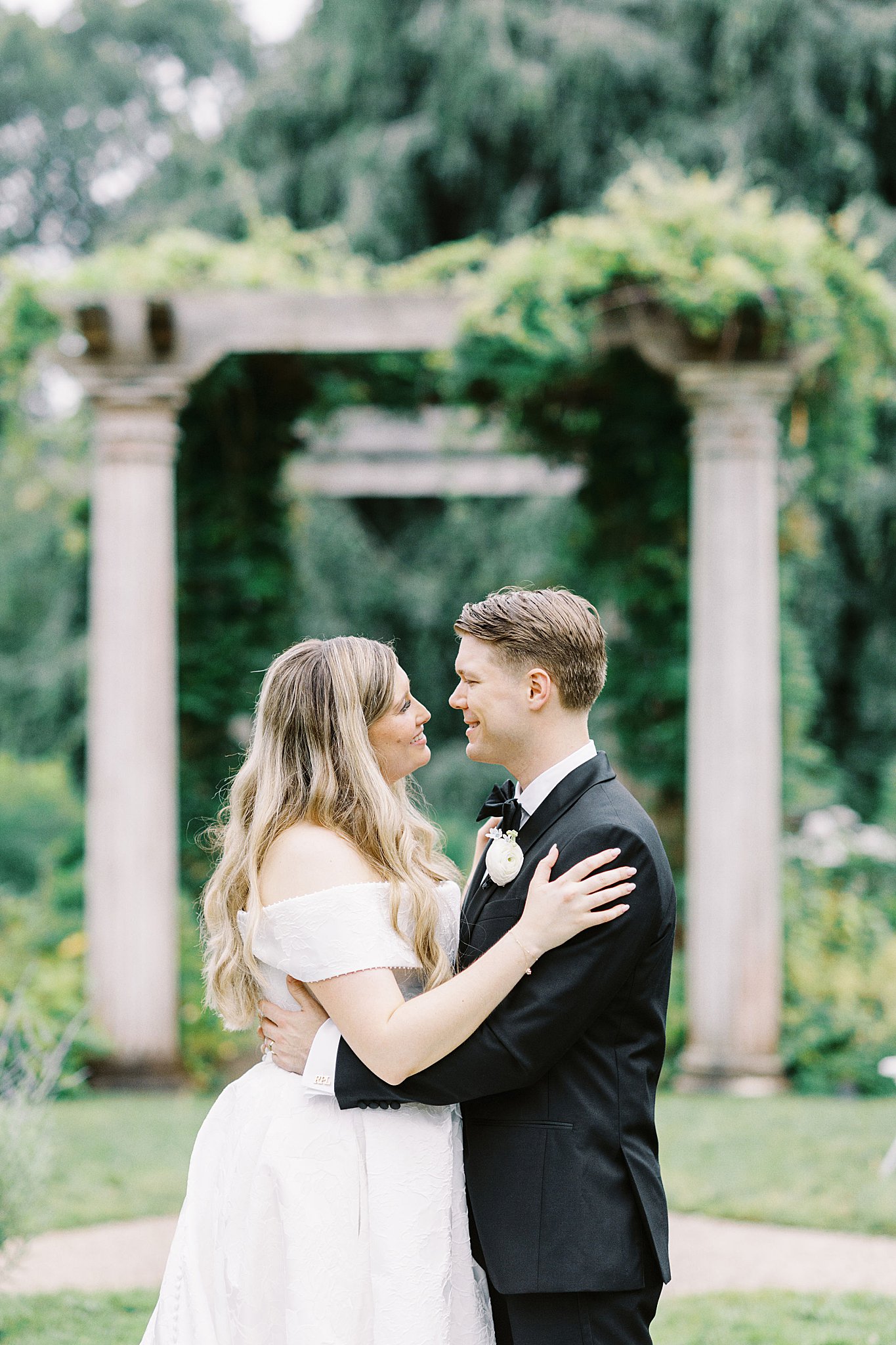 bride and groom look into each other's eyes at Glen Magna Farms