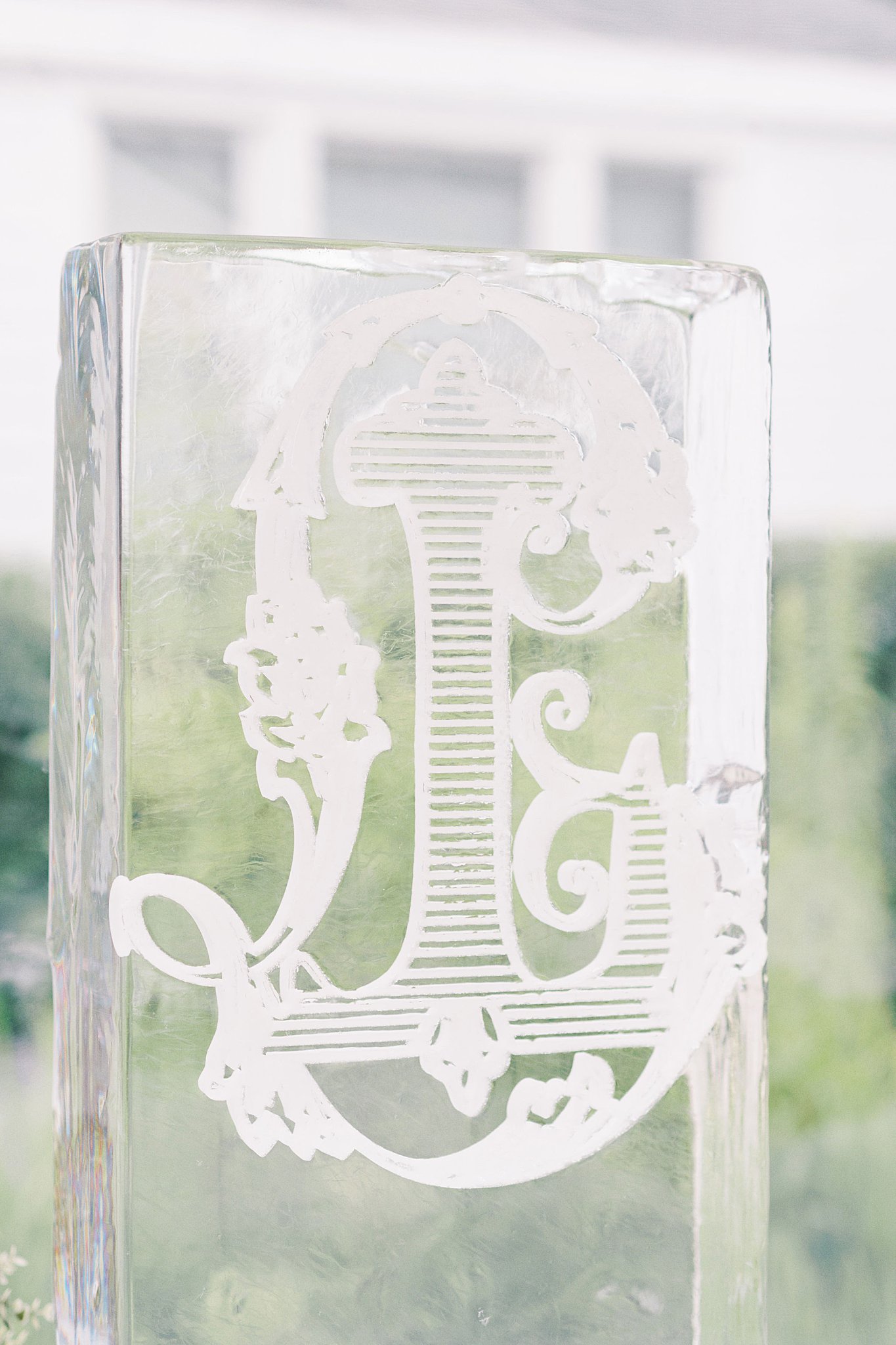 ice sculpture with L monogram by Lynne Reznick Photography