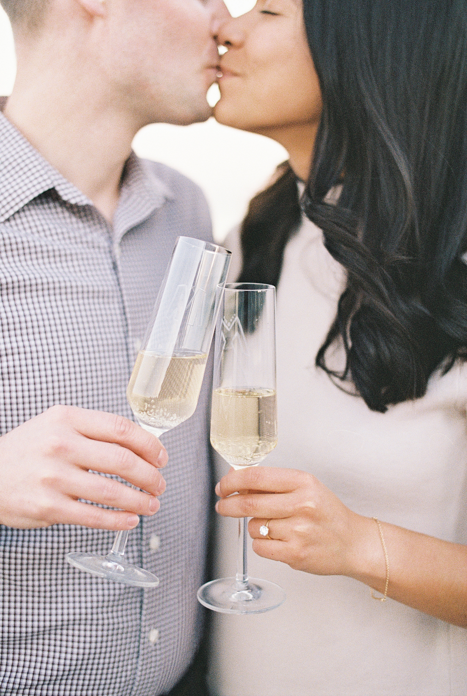 bride and groom to-be share a toast by Boston Wedding Photographer