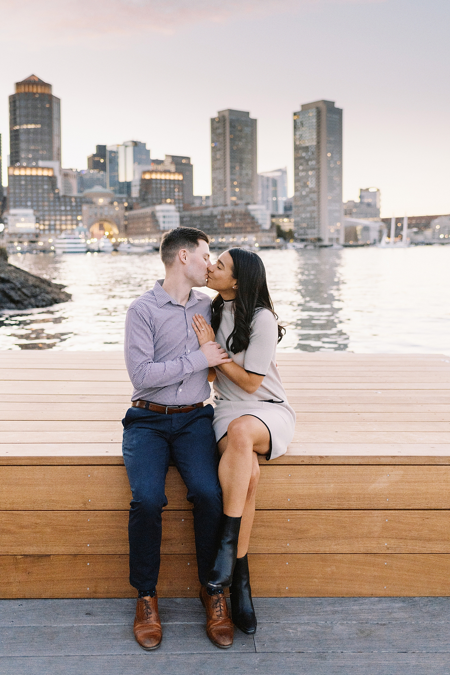 fiancé's kiss near the water for Fan Pier Park Engagement Session