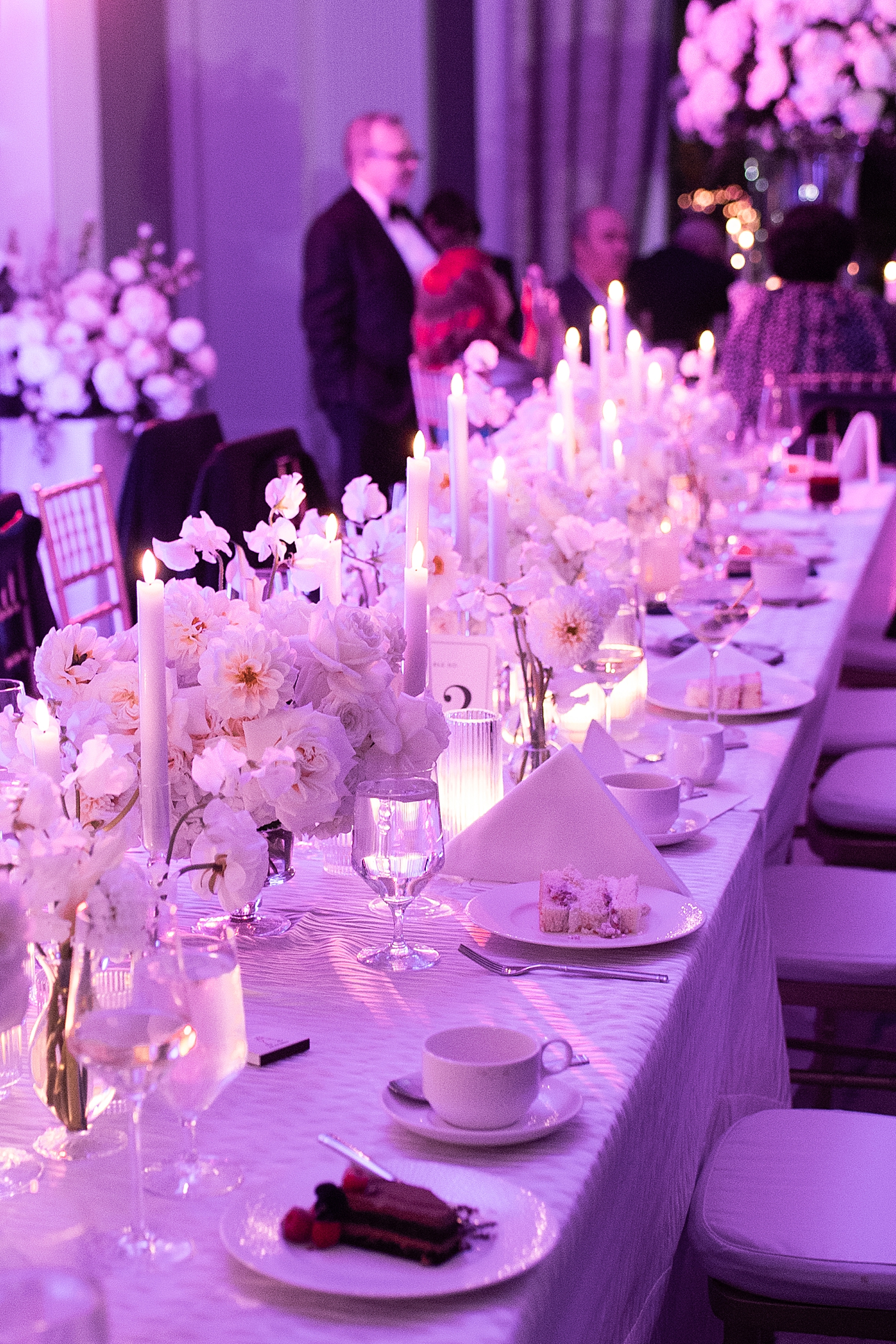 candlelit table under purple lights at Langham Hotel