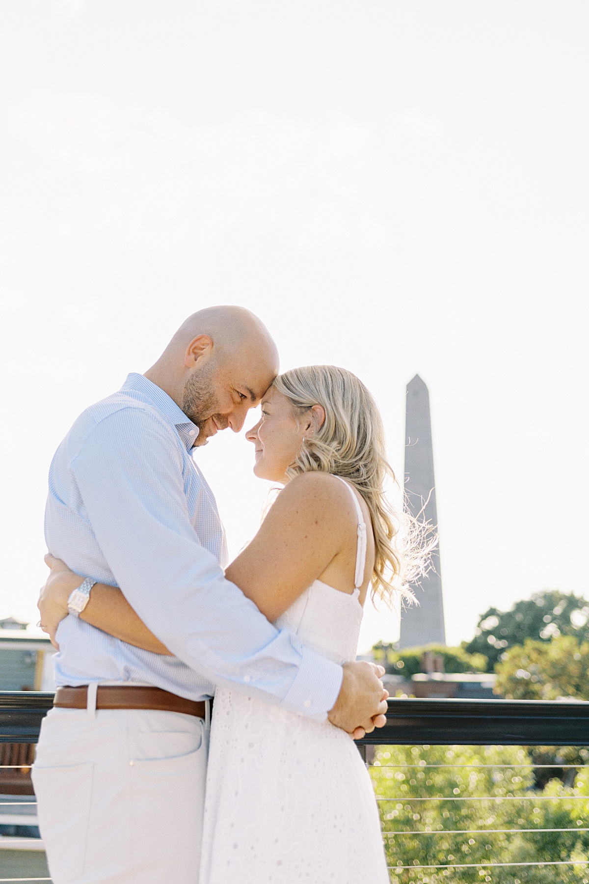 Couple hold each other close during their Charlestown Engagement Session 