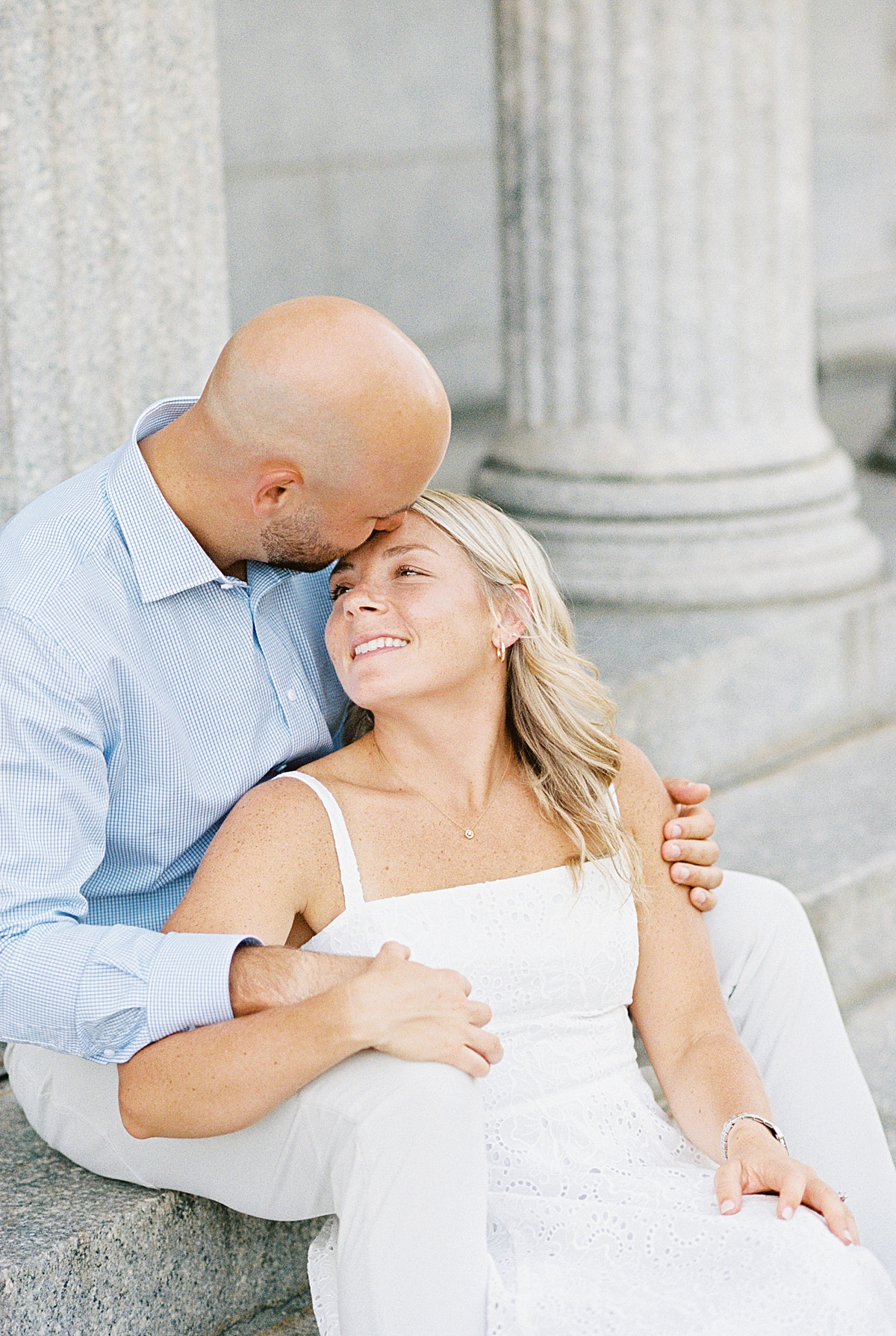 Man kisses woman on her forehead for Boston Wedding Photographer