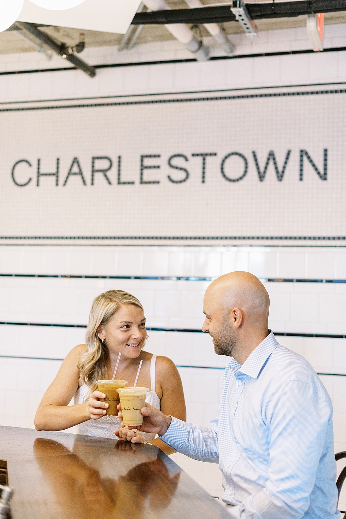 Man and woman share a coffee for Lynne Reznick Photography