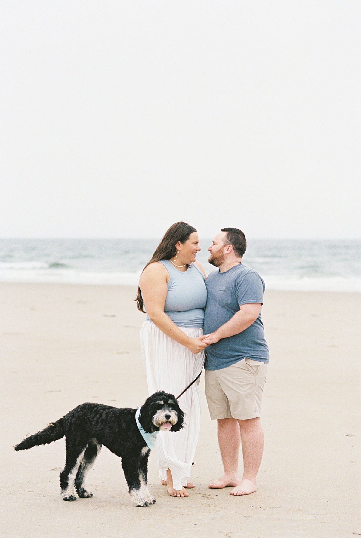 Man and woman share big smiles together for Coastal Maine Wedding Photographer