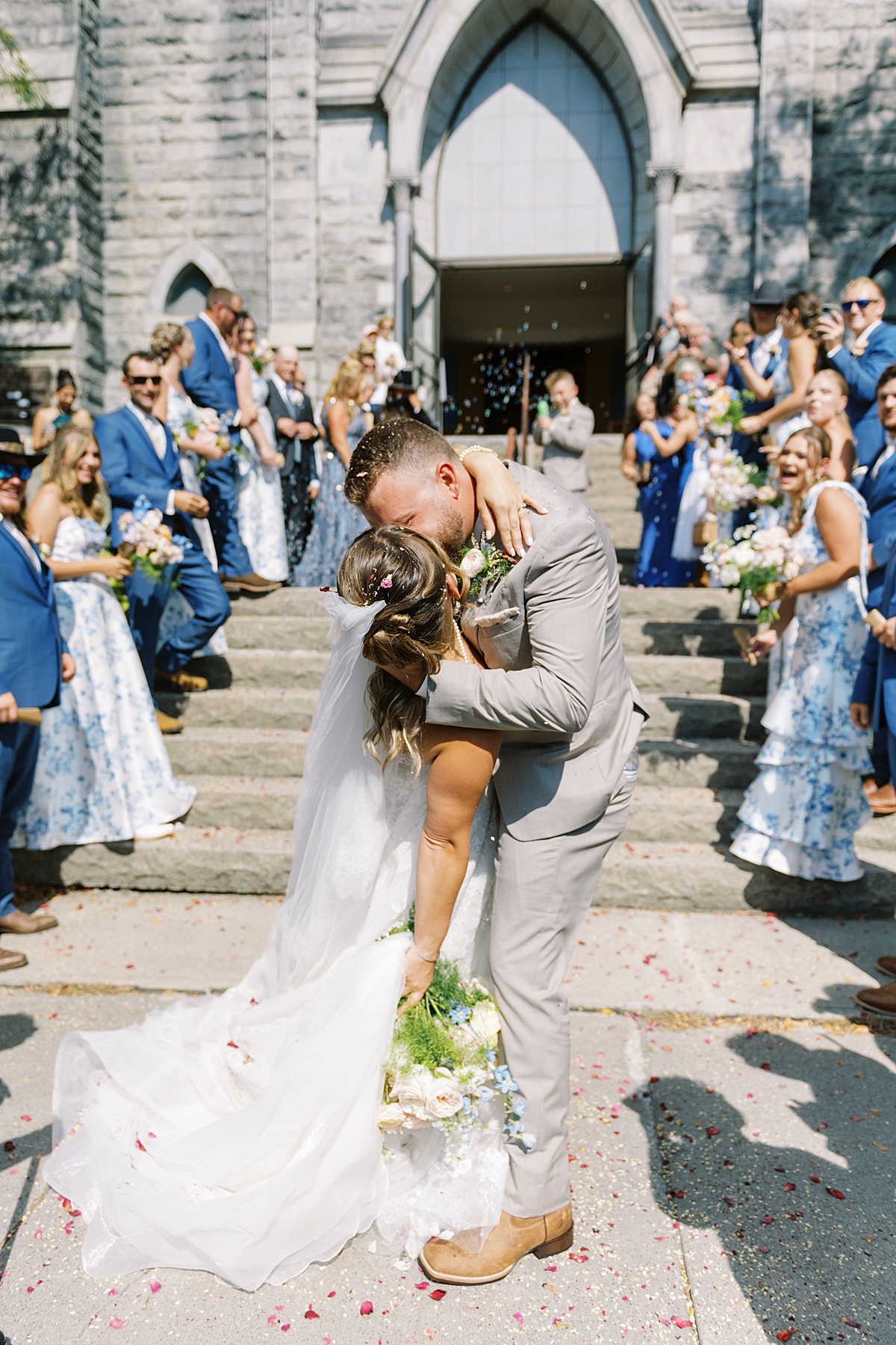 Couple celebrate outside ceremony venue for Boston Wedding Photographer