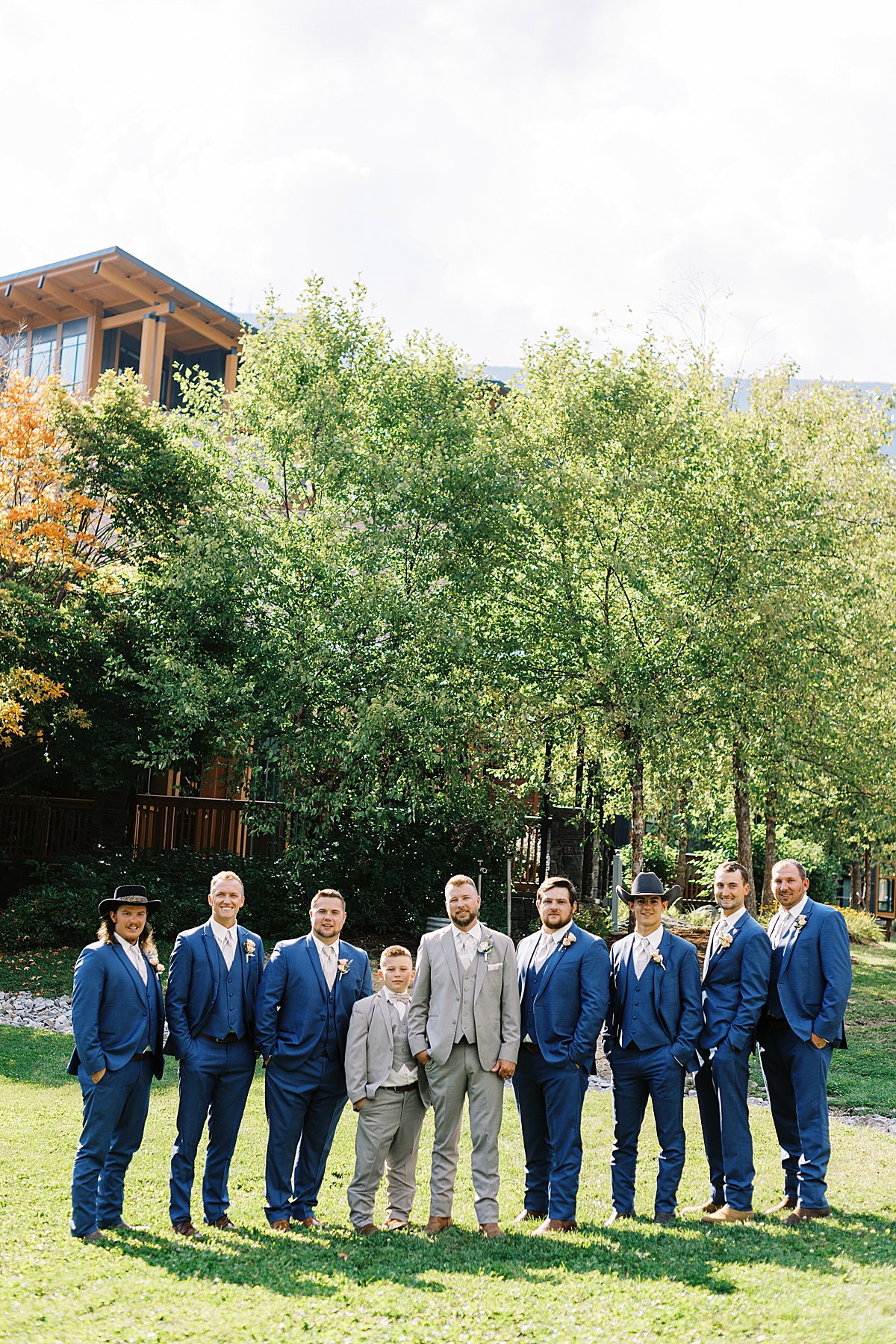 Groomsmen stand with the bride at The Lodge at Spruce Peak