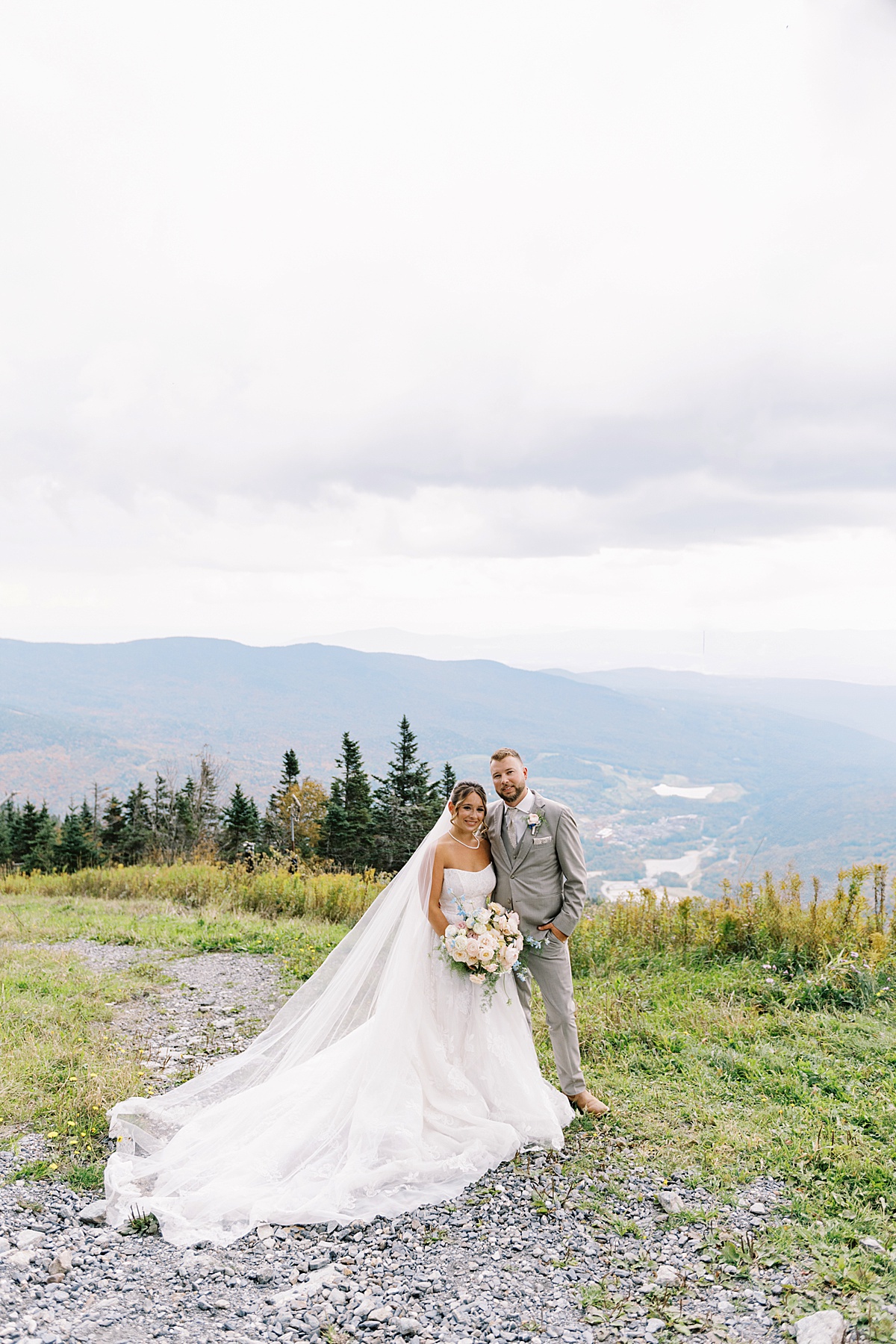 Couple stands together with big smiles for Lynne Reznick Photography