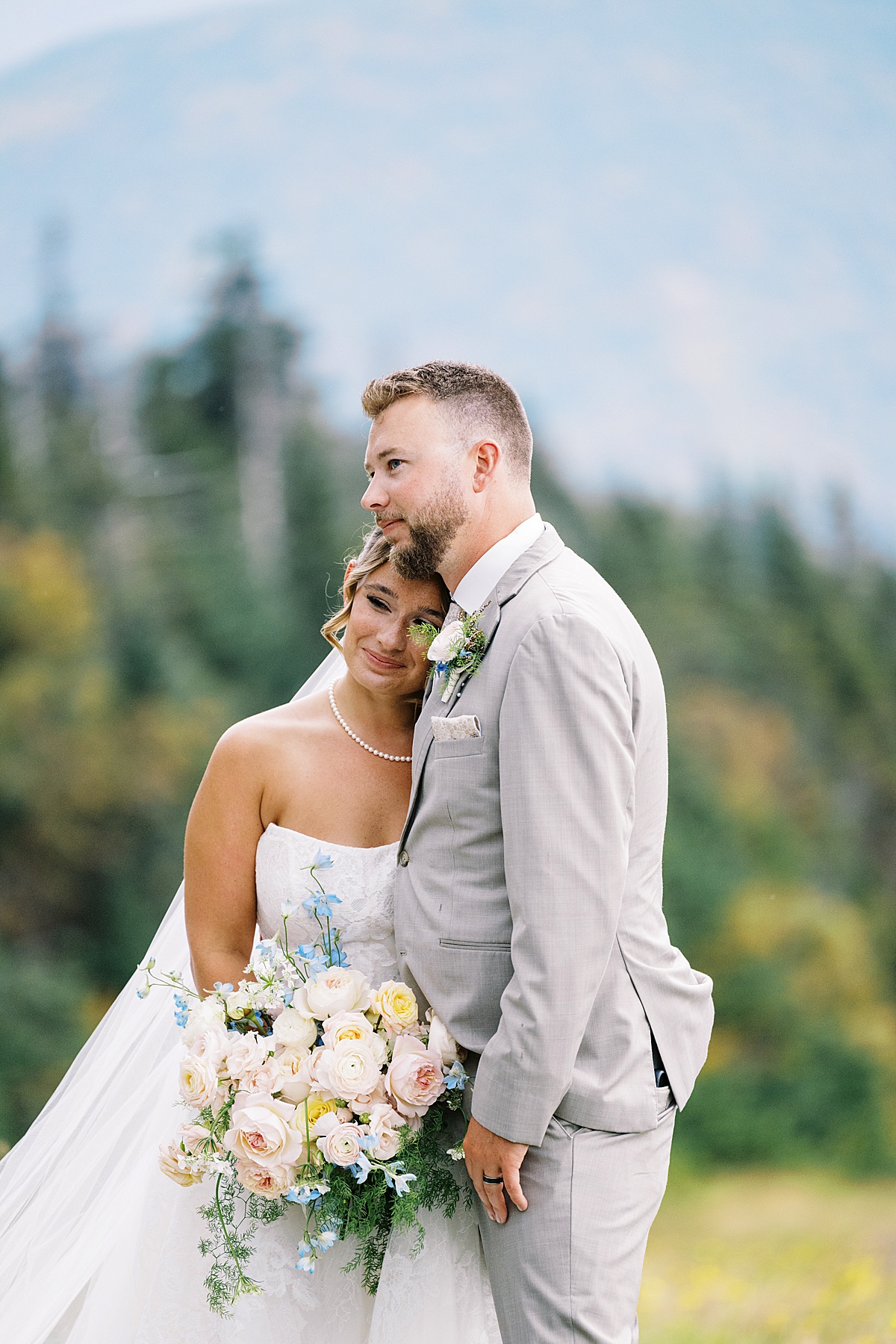 Couple cuddle in close together for Boston Wedding Photographer