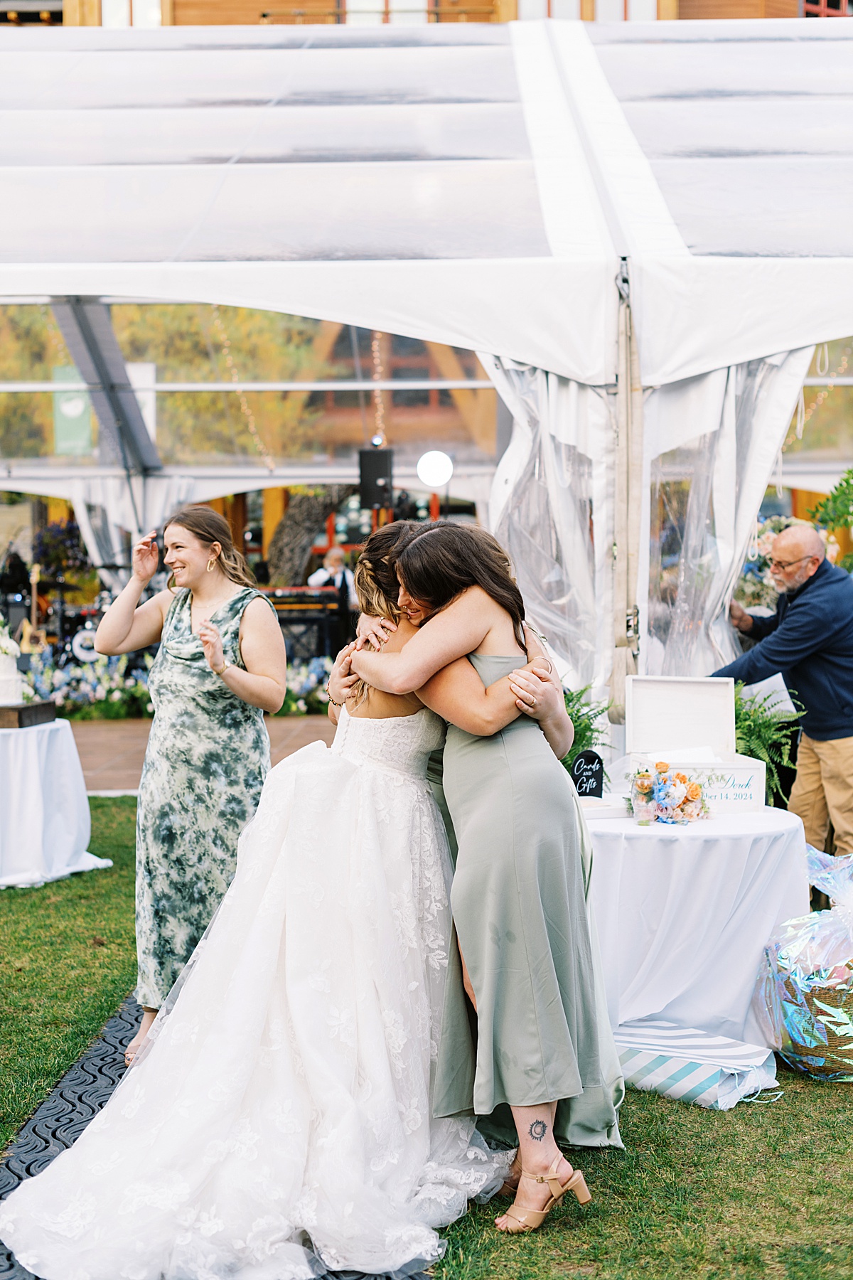 Bride hugs family and friends for Boston Wedding Photographer