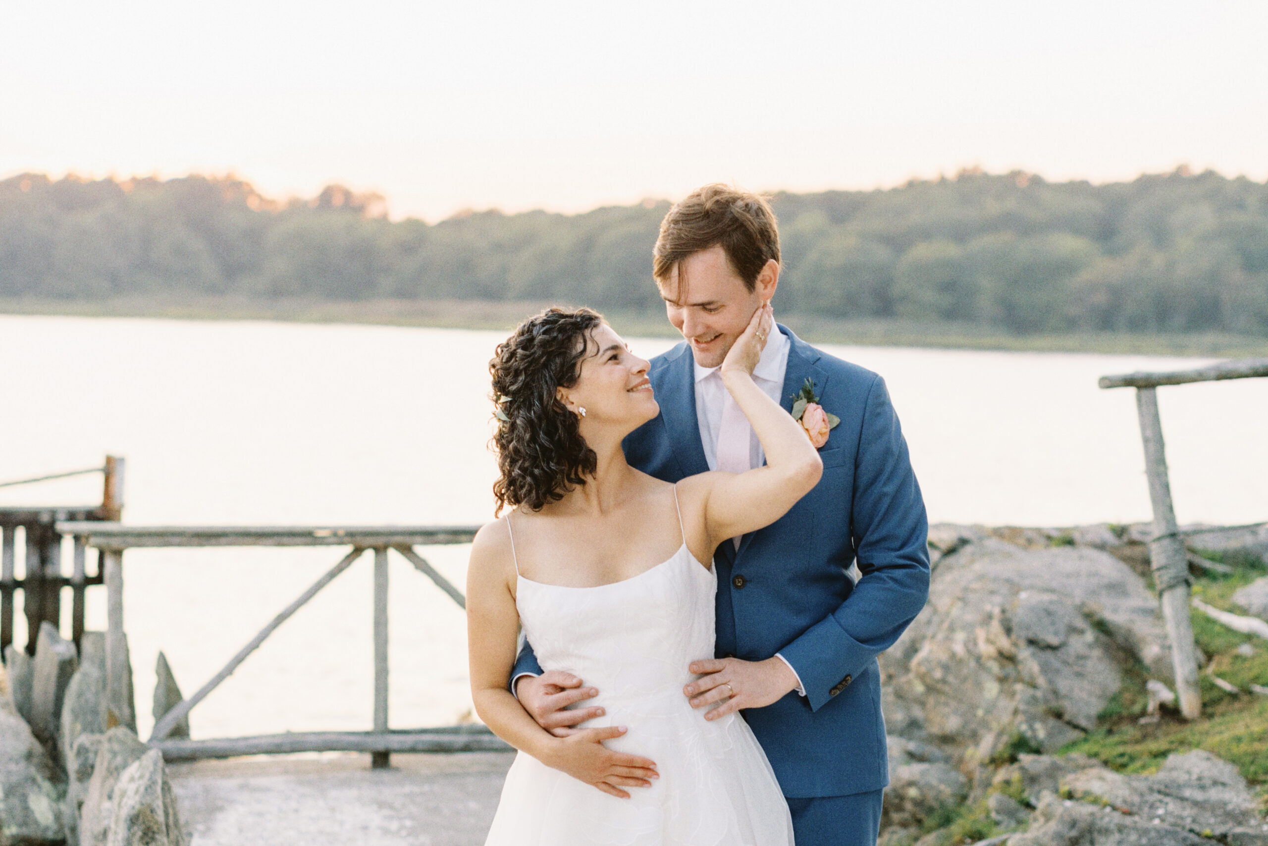 Sunset portrait of couple on their wedding day at Mount Hope Farm