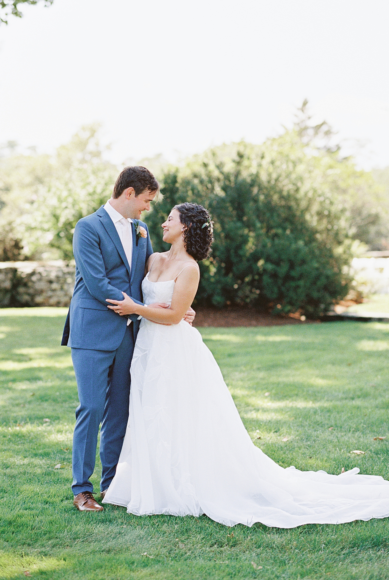 couple wanders on lawn together at Mount Hope Farm