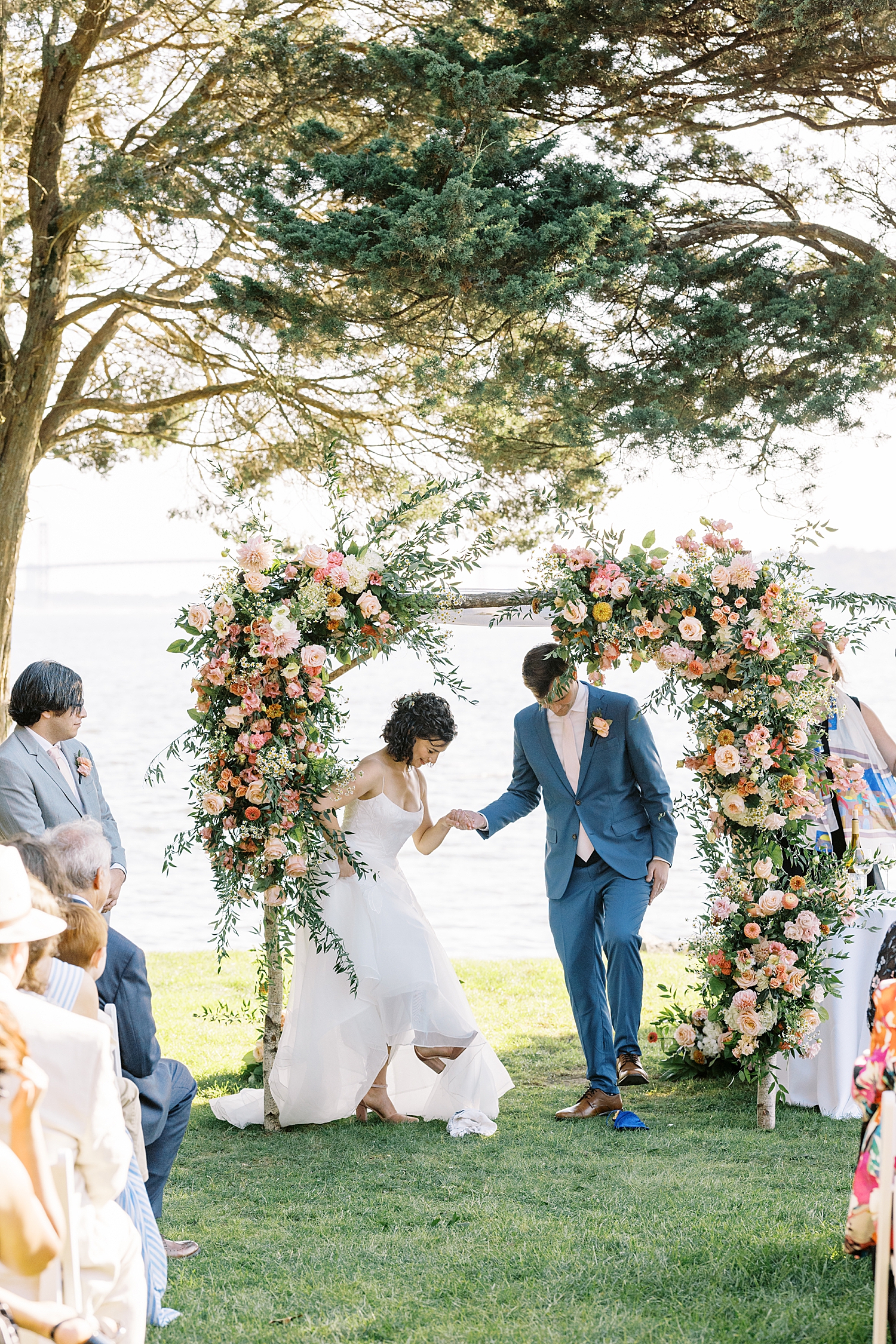 newlyweds step on glass during ceremony by Lynne Reznick Photography