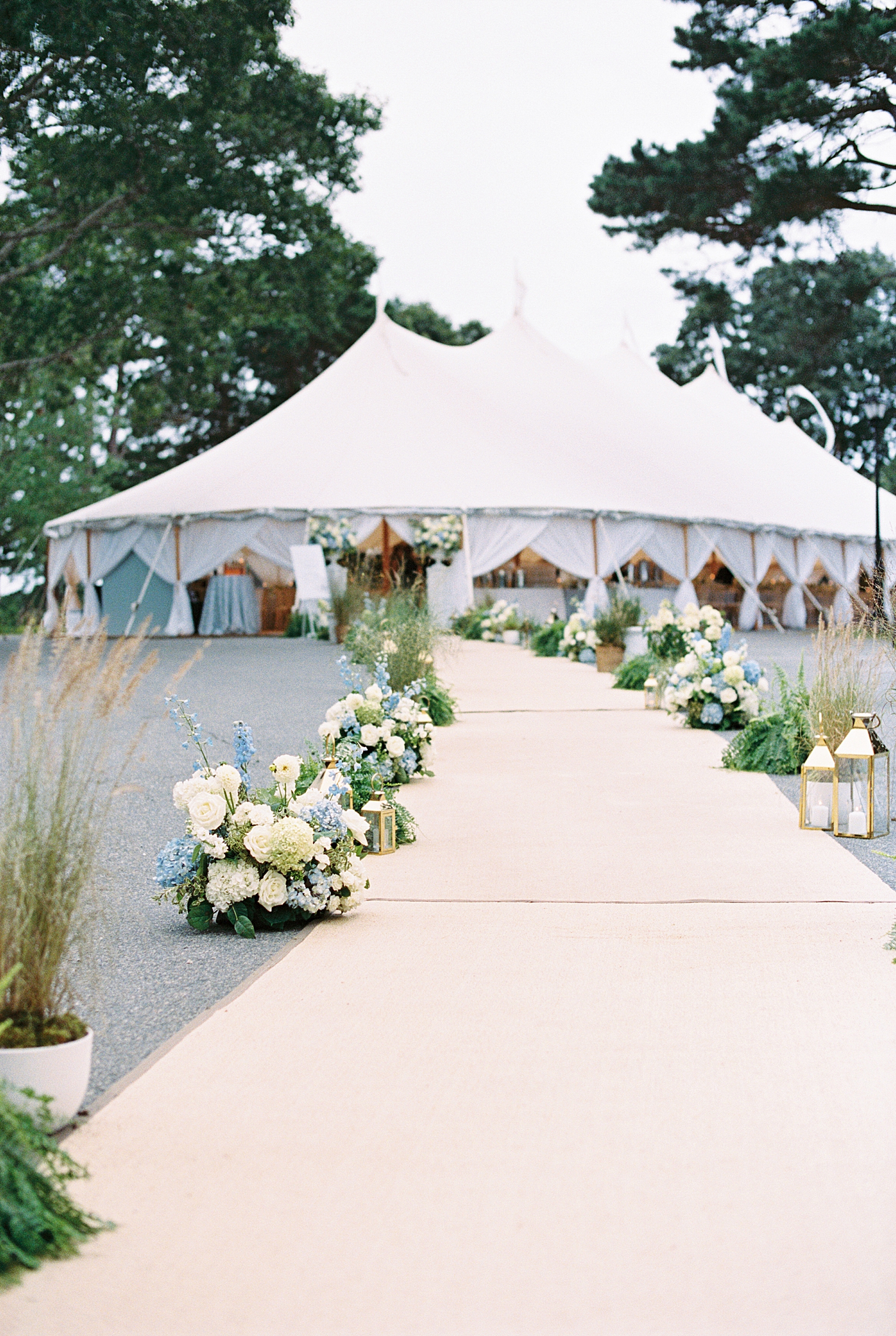 Large tent with coastal walkway by Lynne Reznick Photography