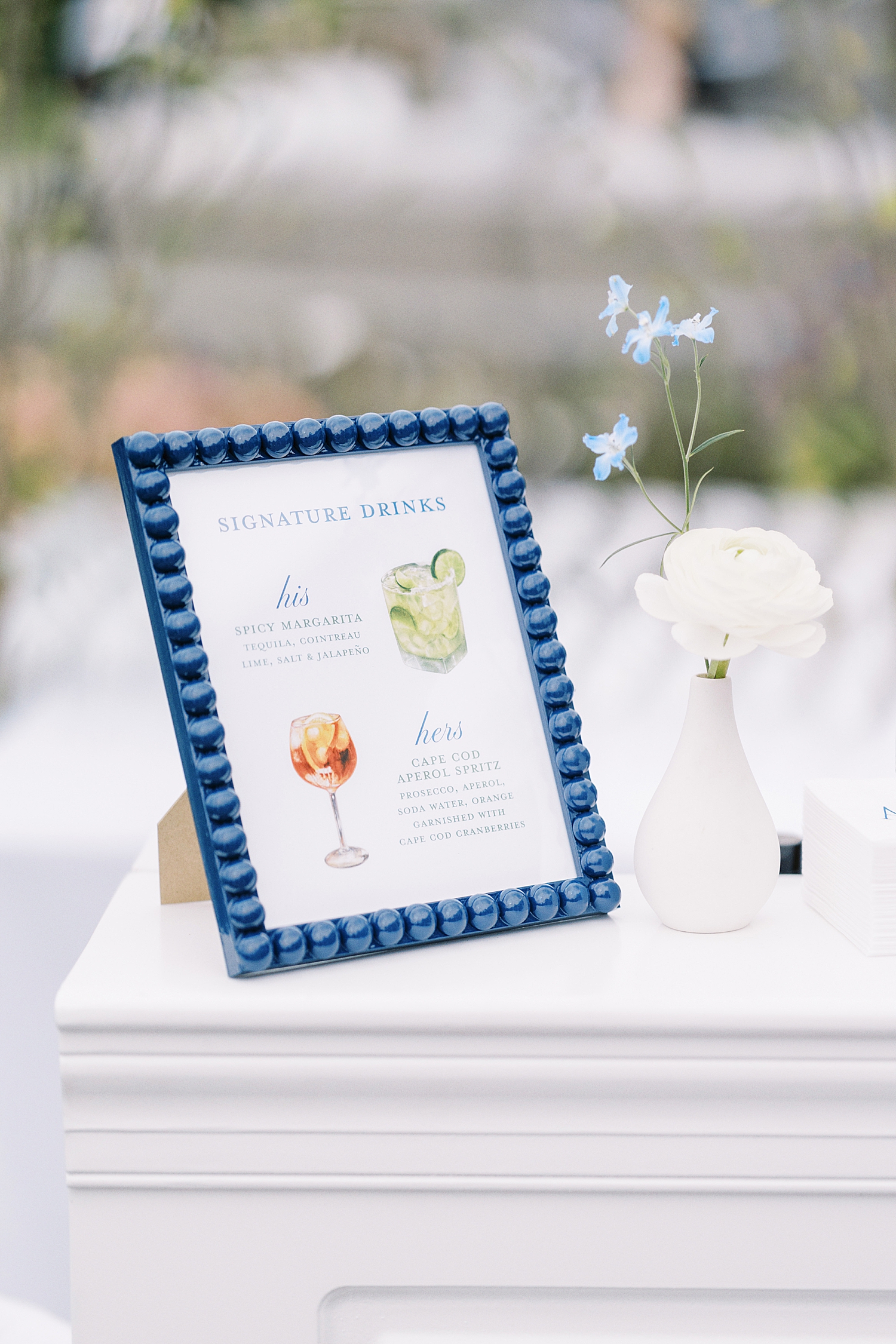signature drink sign in a frame at Oyster Harbors Club